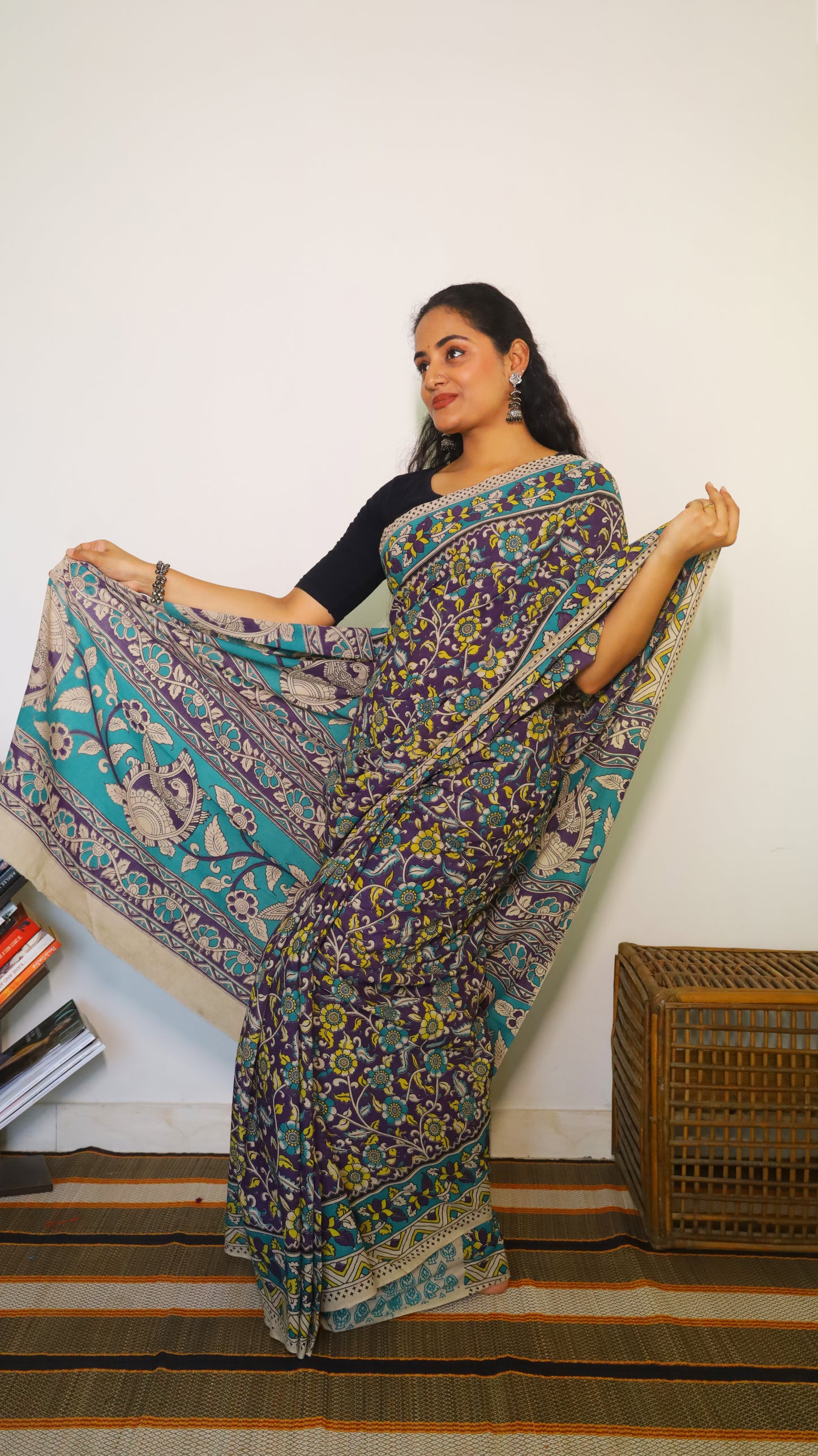 Breathable purple cotton kalamkari saree featuring floral buttas and geometric border - BOOMIKA