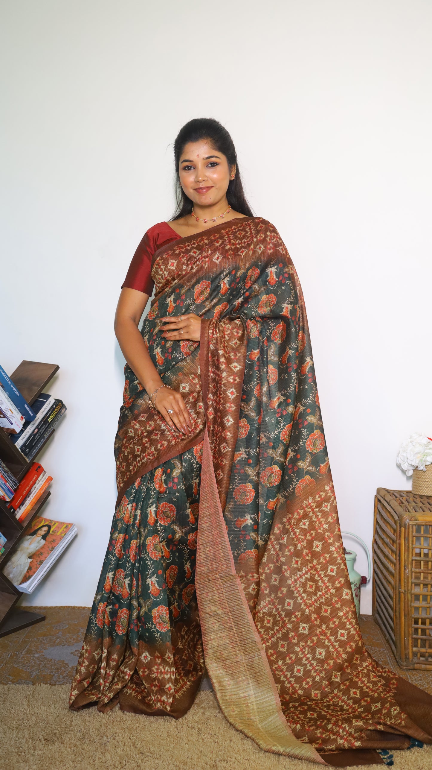 Elegant deep forest green body decorated with rust red and gold floral motifs