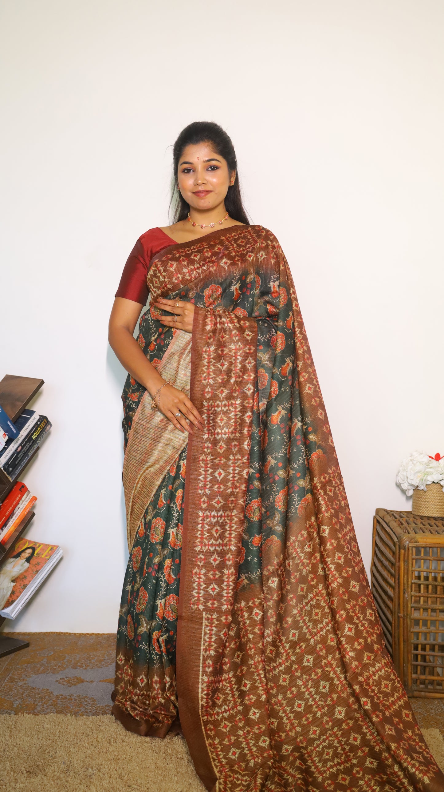 Elegant deep forest green body decorated with rust red and gold floral motifs