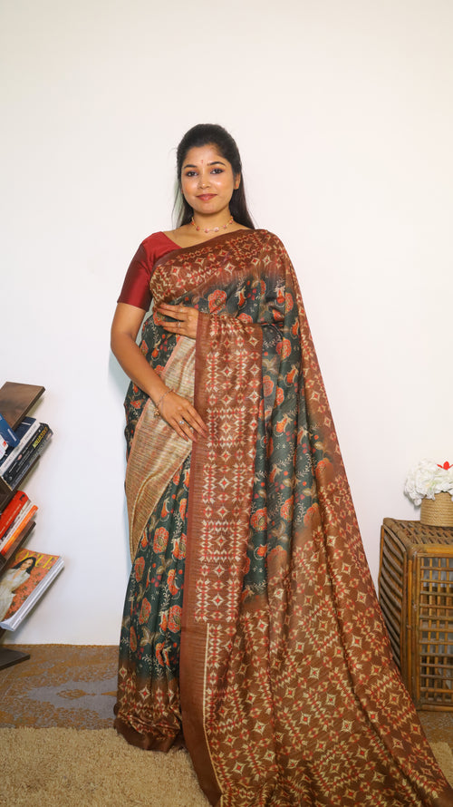 Elegant deep forest green body decorated with rust red and gold floral motifs