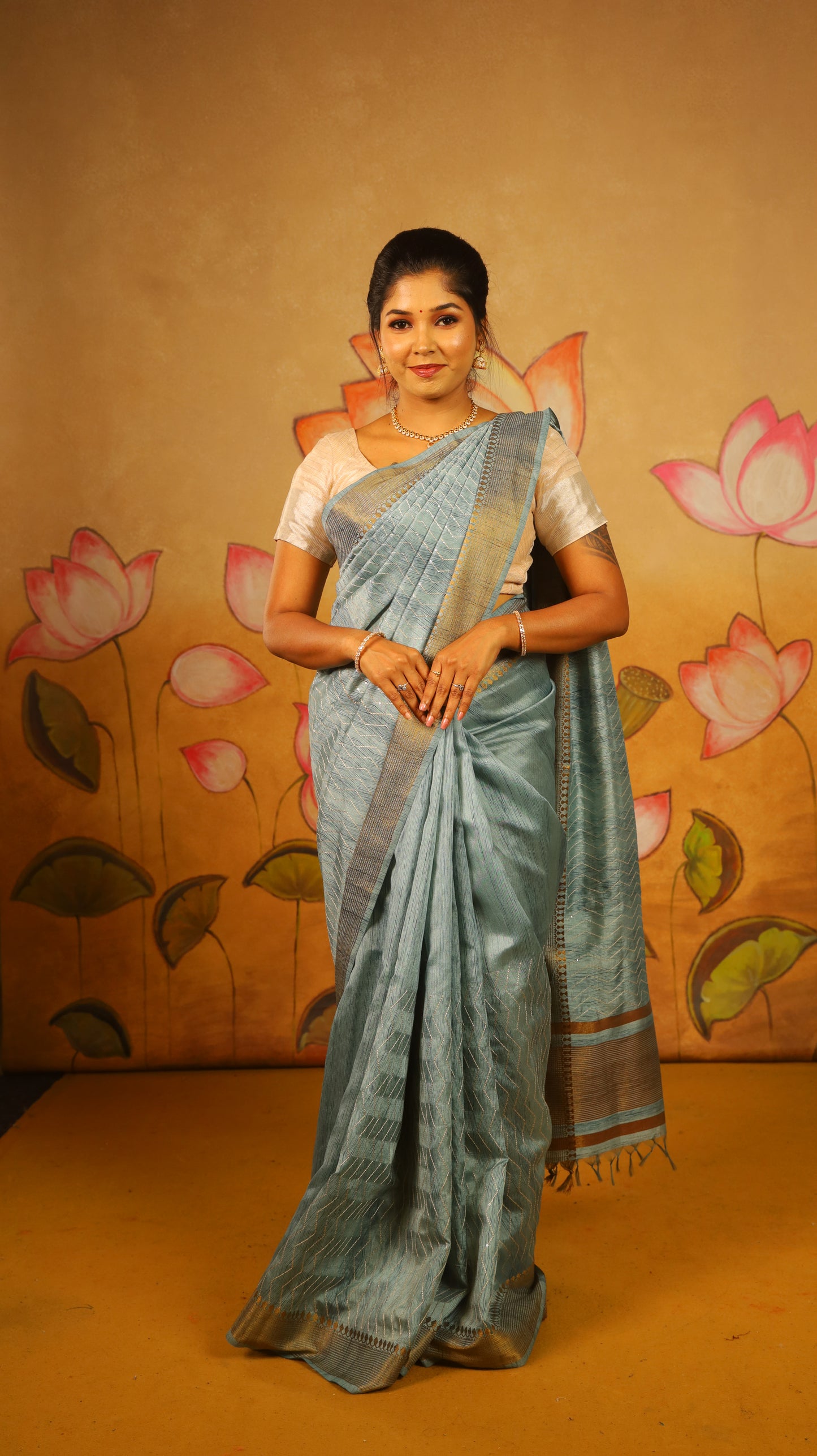 Elegant bright and breezy, this turquoise blue saree with an earthy dull gold border. Perfect for poojas, or gifting - PREETHIKA