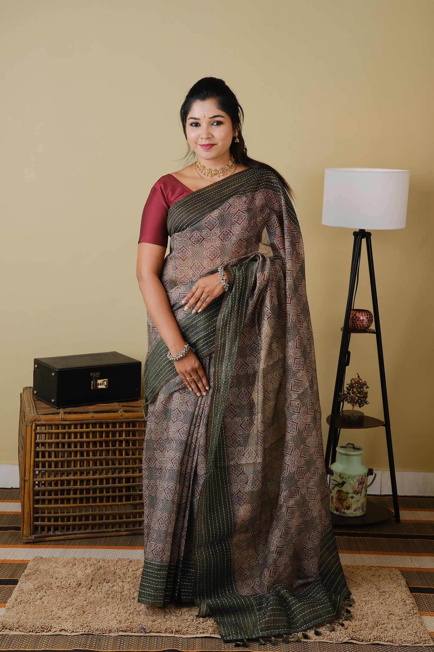 Soft cotton in olive green with mughal print and olive green embroided border - BOOMIKA