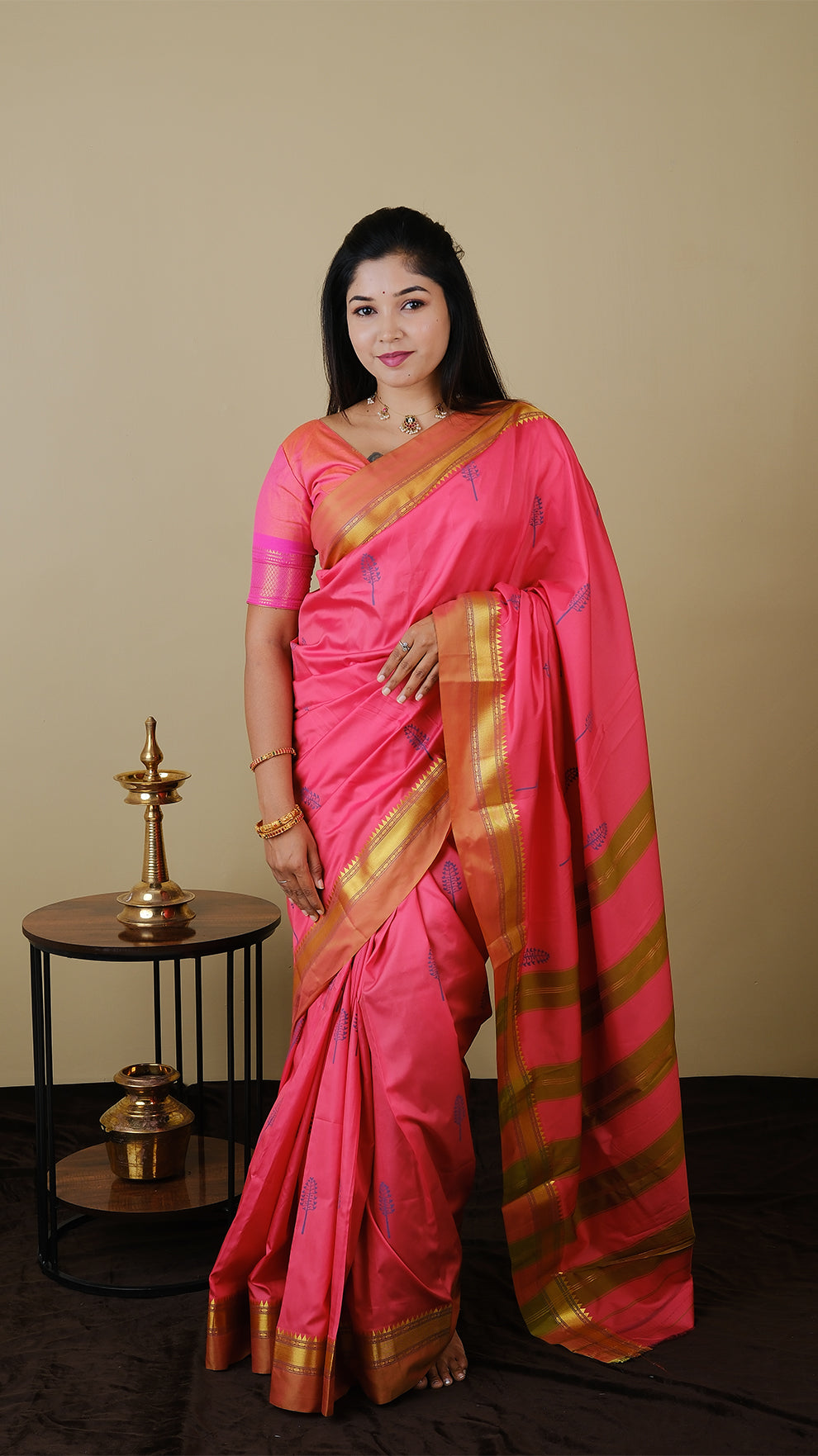 Elegant peach pink with olive combination silk saree adorned with blue woven motifs and contrasting gold zari border - AVANTHIKA (20003006)