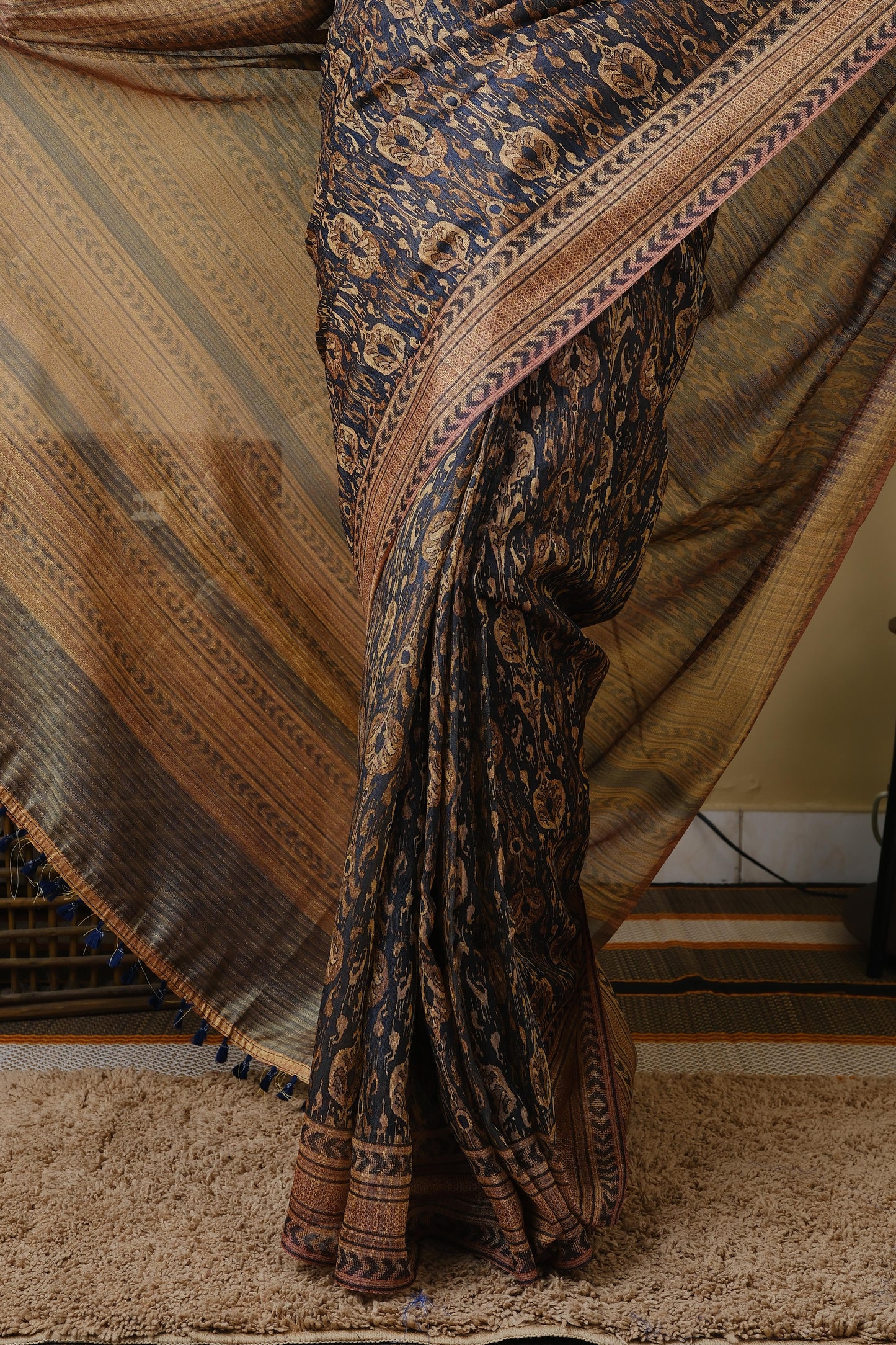 Soft cotton in black with golden tribal prints and pinkish brown border - BOOMIKA