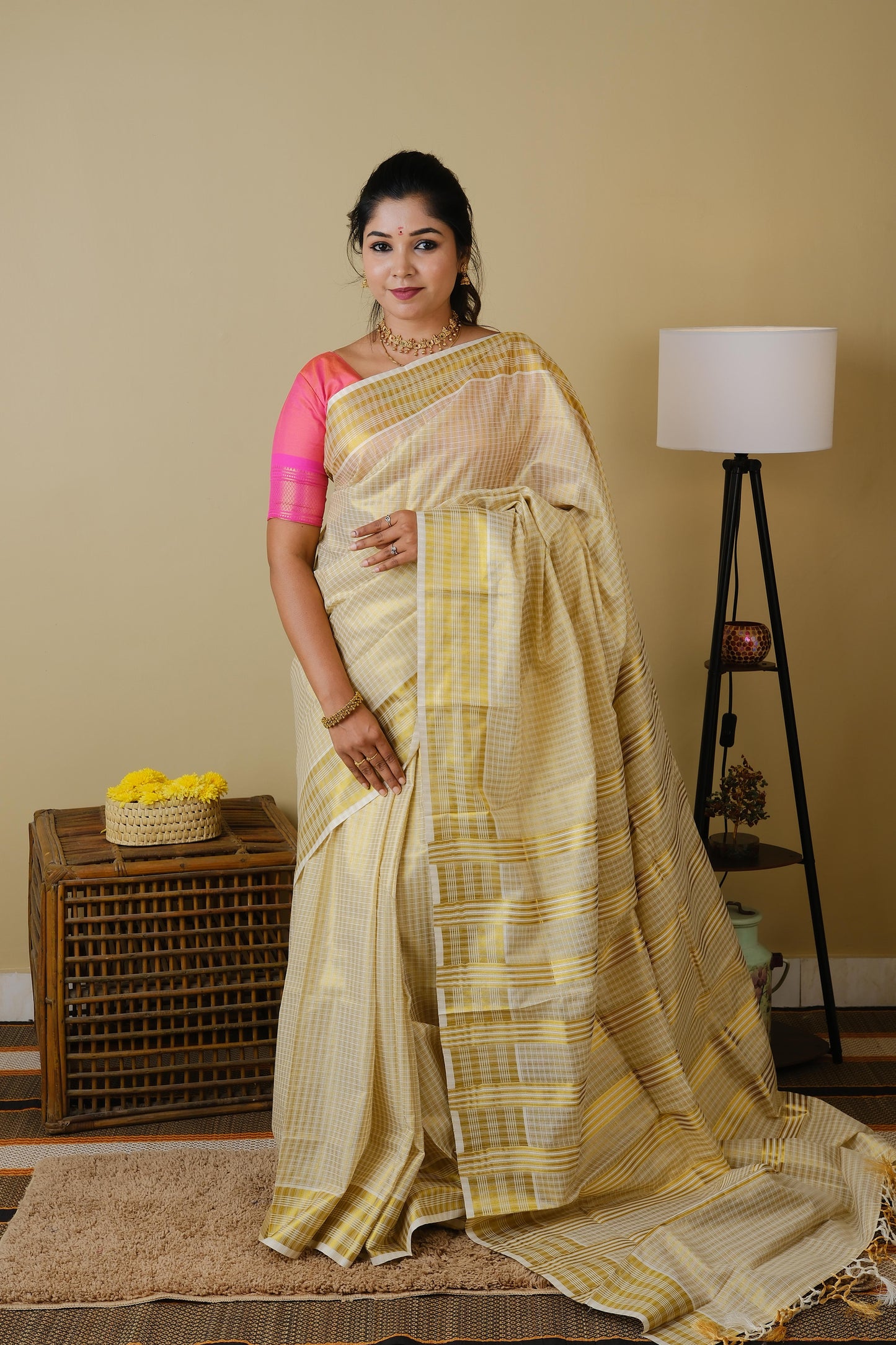 Onam kasavu silk in cream with all over checks in gold zari - AVANTHIKA