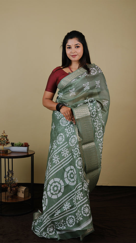 Kilimanjaro Cotton in Mint Green with white batik style print in gold zari border - BOOMIKA (30010044)