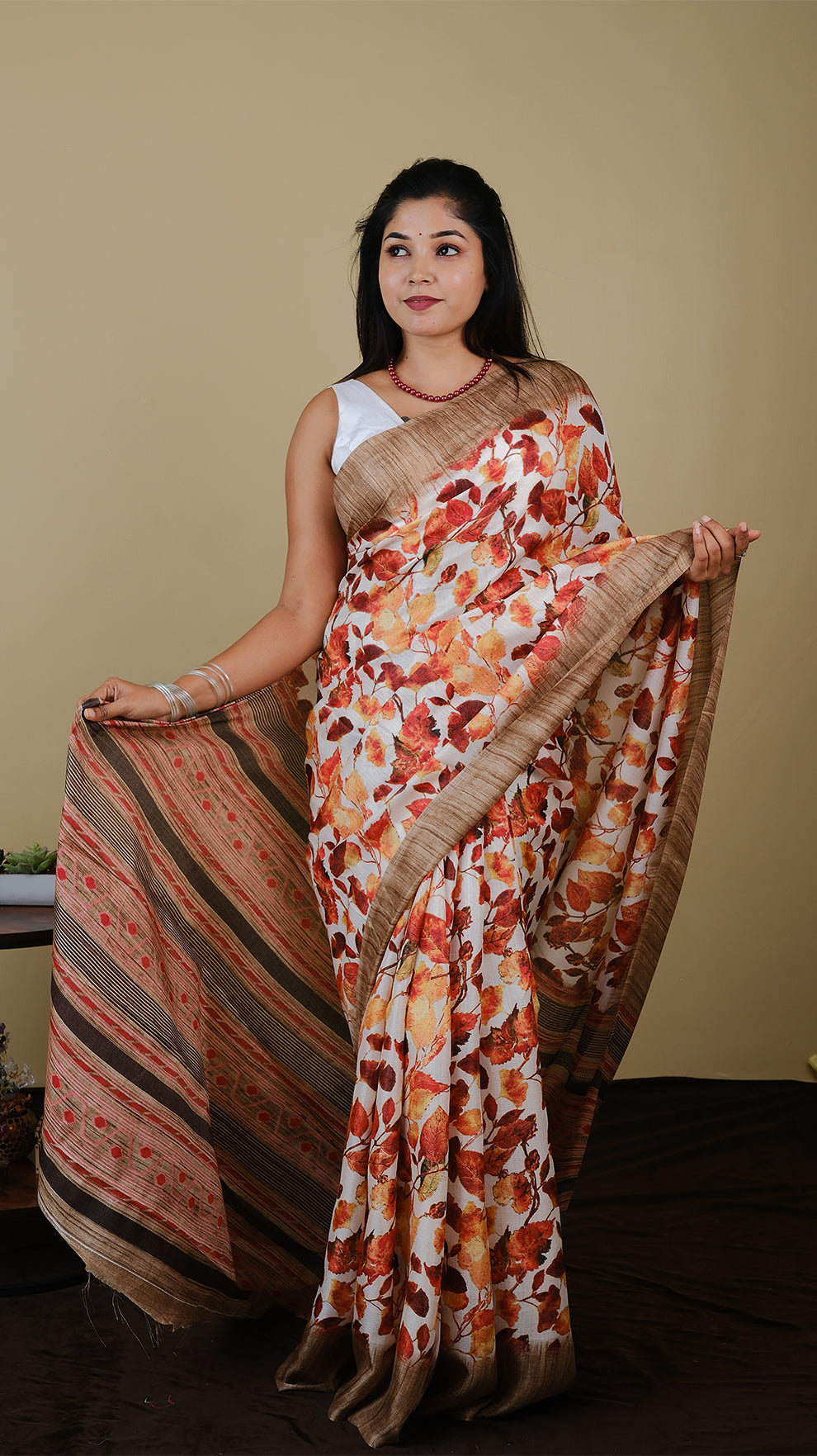 Digital saree in autumn brown with red leaf motif and satin border - AVANTHIKA (20003007)