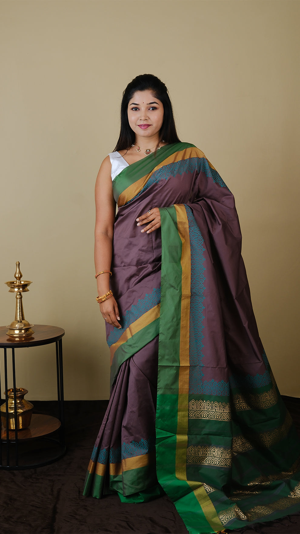 Soft silk saree in purplish brown and sea green block print with simple border in gold zari and parrot green - AVANTHIKA (20014003)