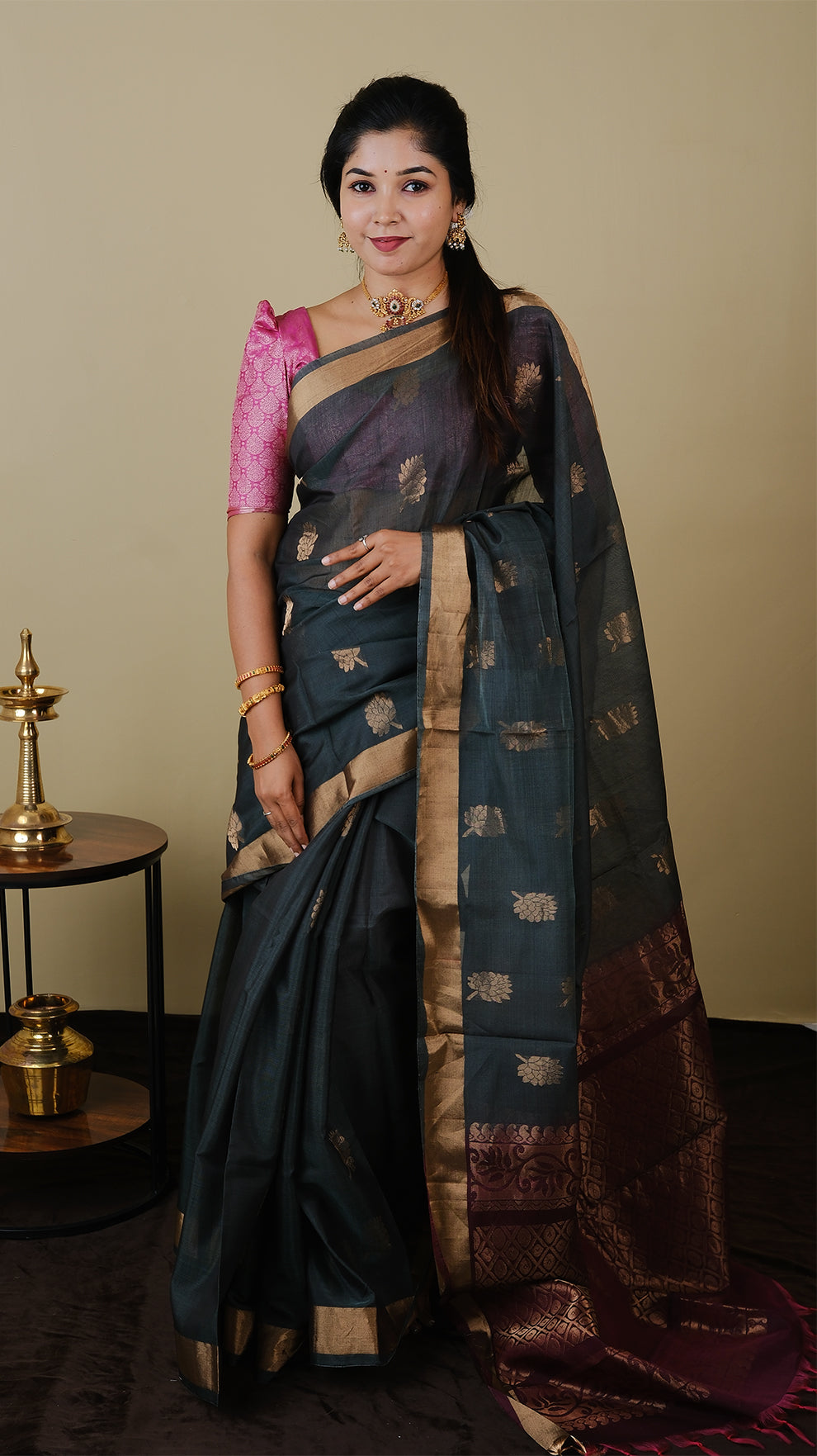 Cotton silk in bottle green with gold flower motif and plum pink contrast zari border and pallu - AVANTHIKA (20009026)