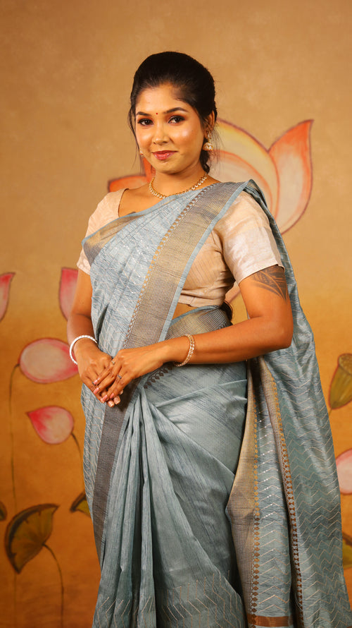 Elegant bright and breezy, this turquoise blue saree with an earthy dull gold border. Perfect for poojas, or gifting - PREETHIKA