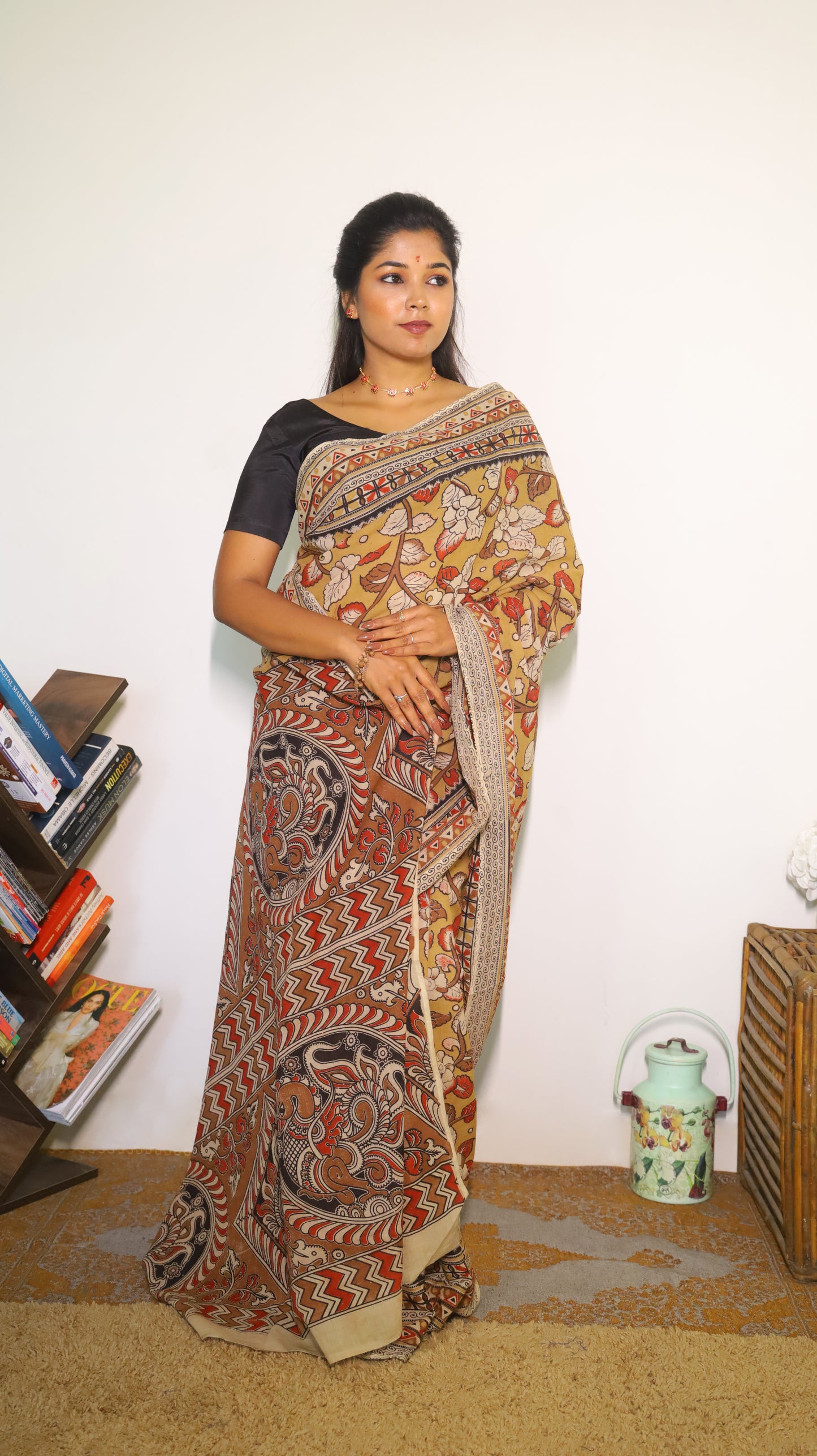 Vibrant mustard yellow soft cotton Kalamkari print saree with flowers and peacocks in light grey and black  - BOOMIKA