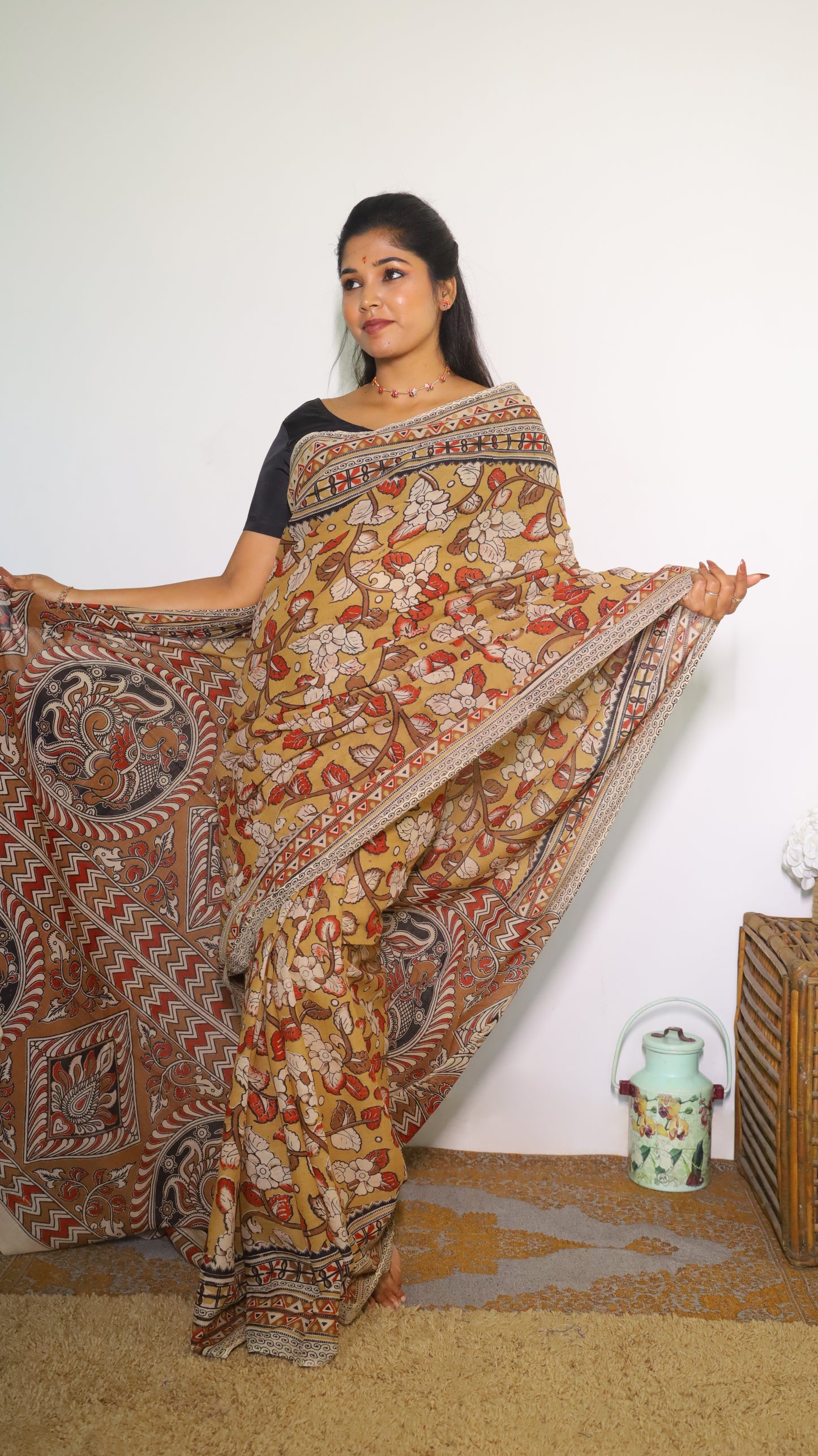 Vibrant mustard yellow soft cotton Kalamkari print saree with flowers and peacocks in light grey and black  - BOOMIKA