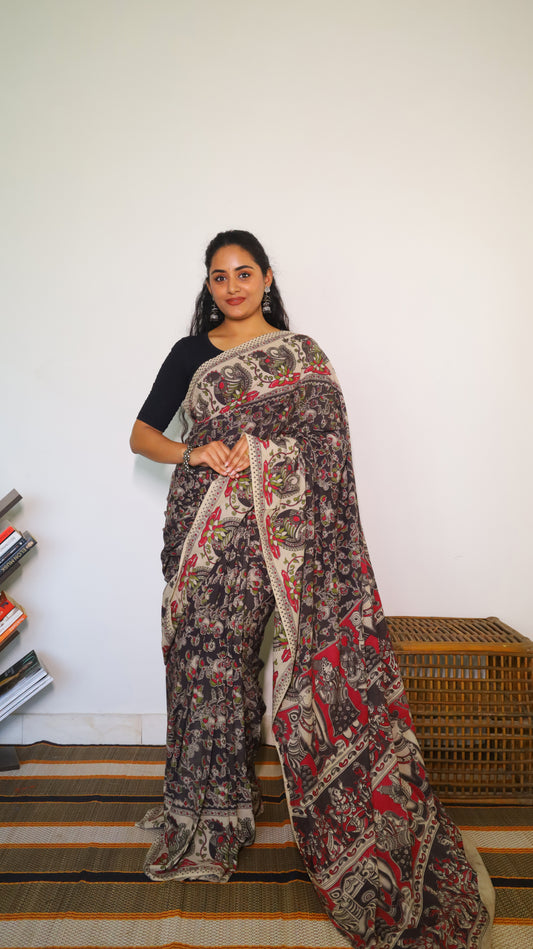 Sophisticated black base soft cotton Kalamkari print with artistic designs of peacocks and florals - BOOMIKA