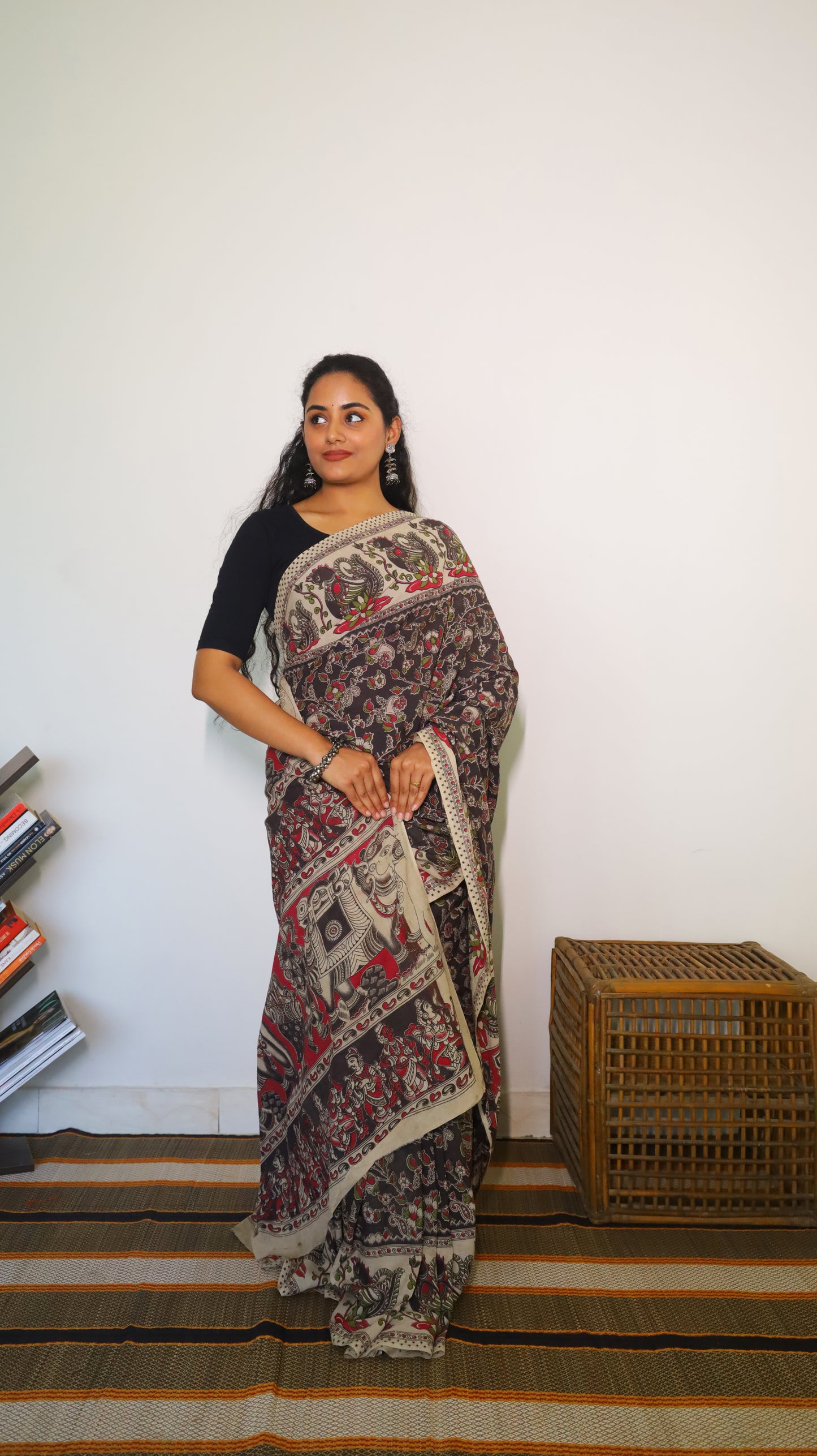 Sophisticated black base soft cotton Kalamkari print with artistic designs of peacocks and florals - BOOMIKA