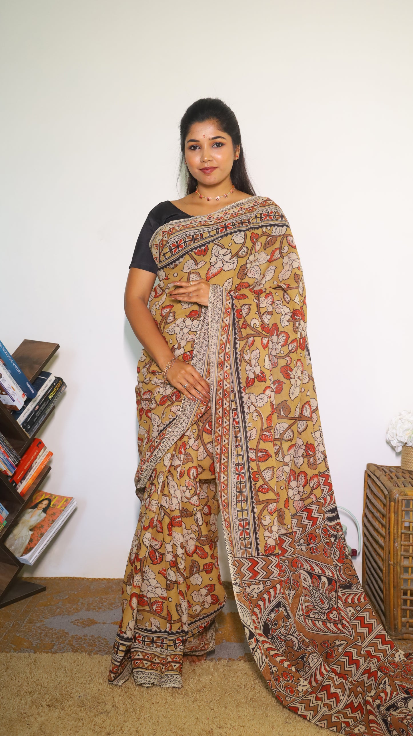 Vibrant mustard yellow soft cotton Kalamkari print saree with flowers and peacocks in light grey and black  - BOOMIKA