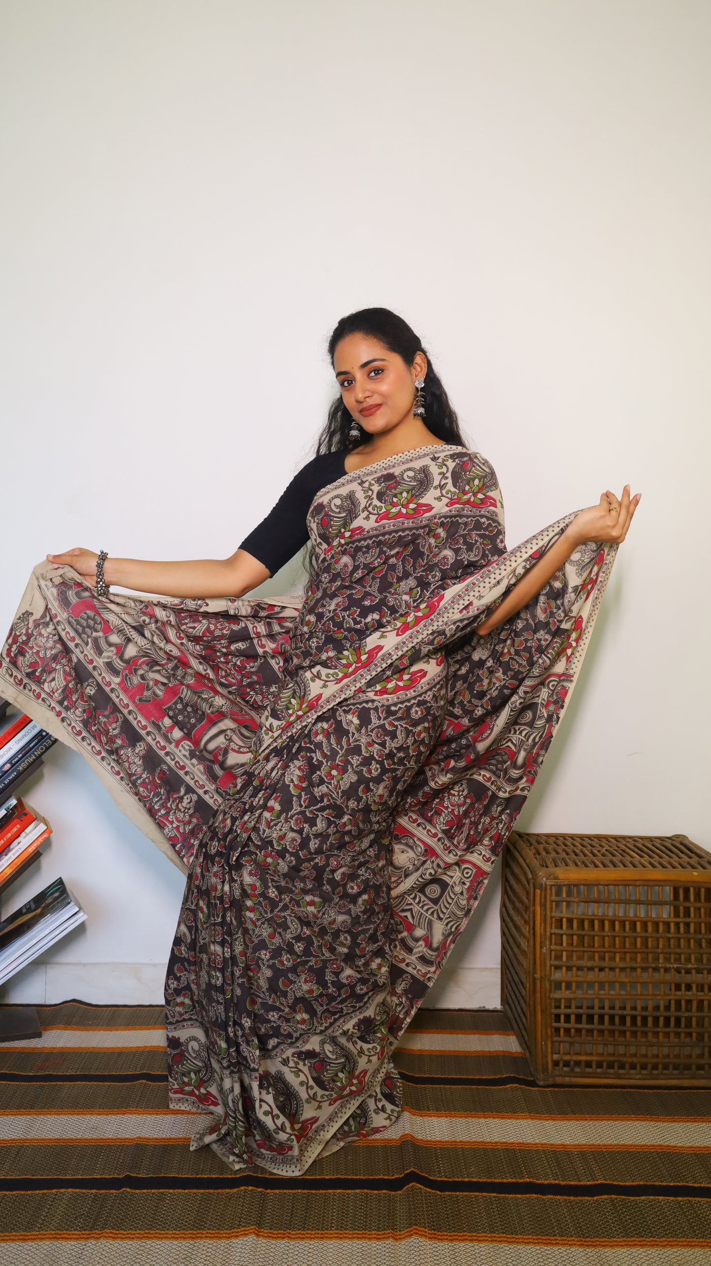 Sophisticated black base soft cotton Kalamkari print with artistic designs of peacocks and florals - BOOMIKA