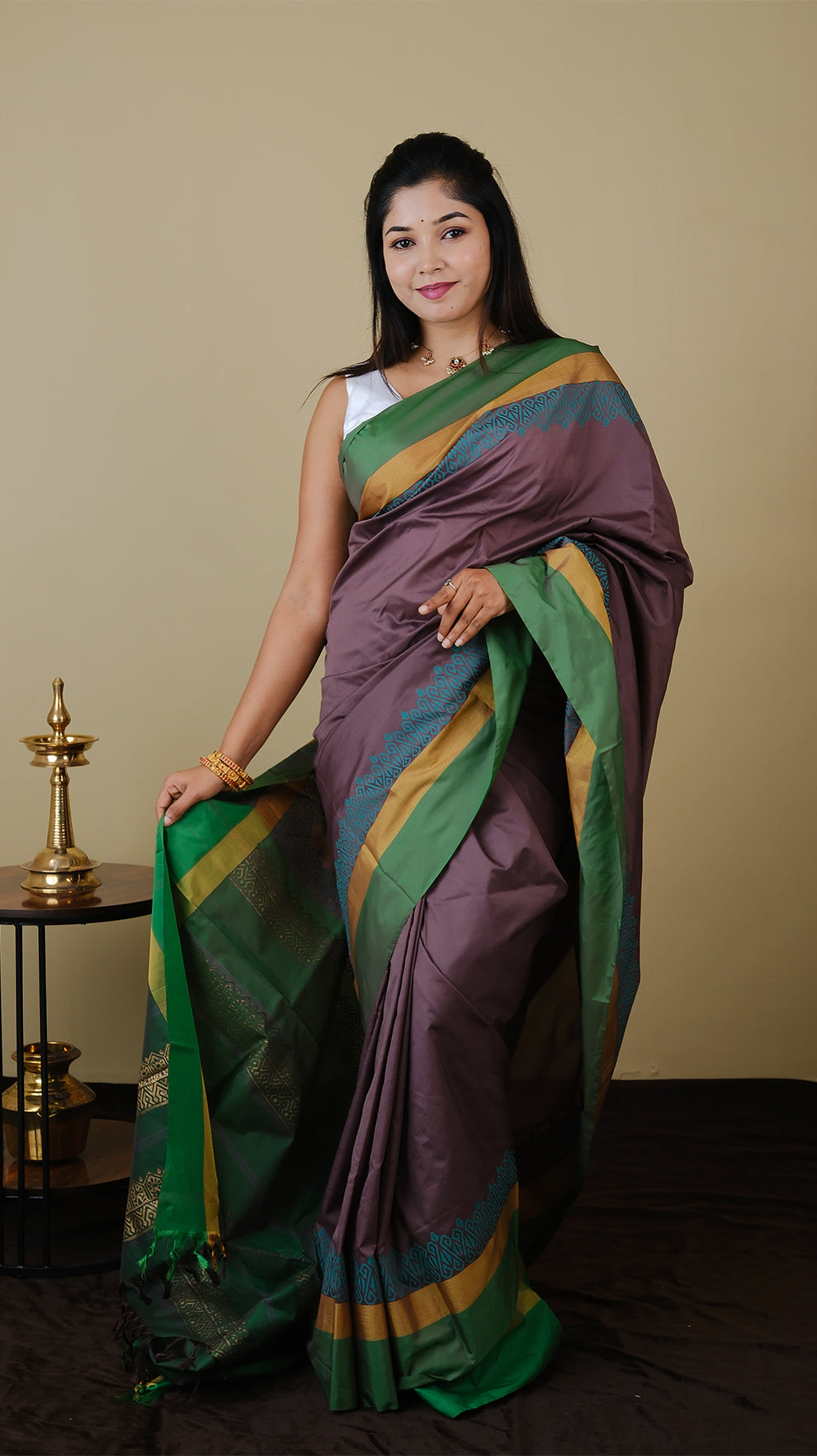 Soft silk saree in purplish brown and sea green block print with simple border in gold zari and parrot green - AVANTHIKA (20014003)