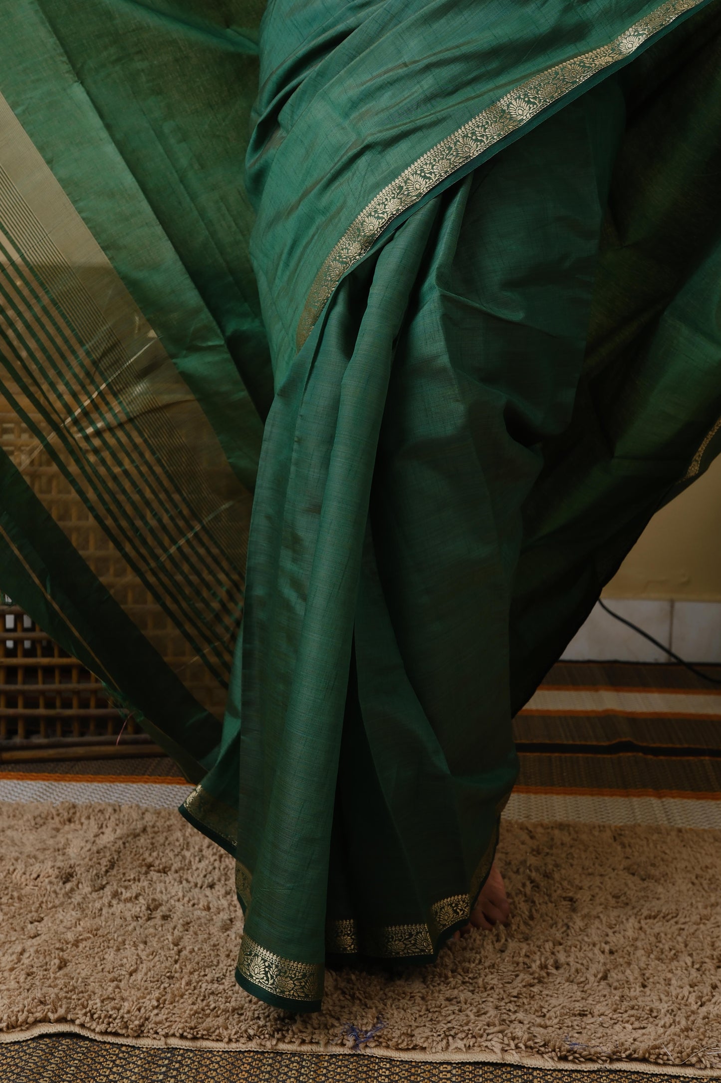 Exquisite soft silk olive green saree with zari border - AVANTHIKA