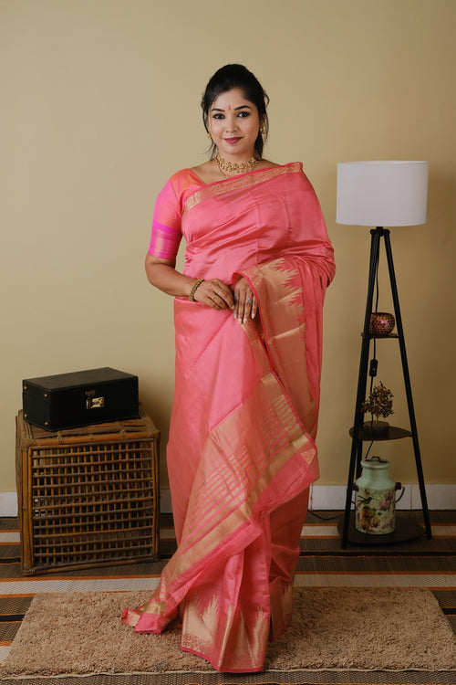 Soft silk in hot pink with tanjore zari border and striped pallu - AVANTHIKA