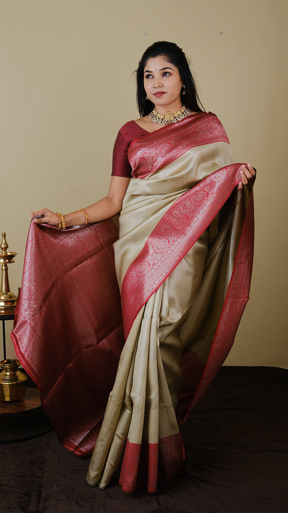 Mango silk brocade in deep cream with vairaoosi and silver motif body with blood red contrast pallu and double silver zari border - AVANTHIKA (20009023)