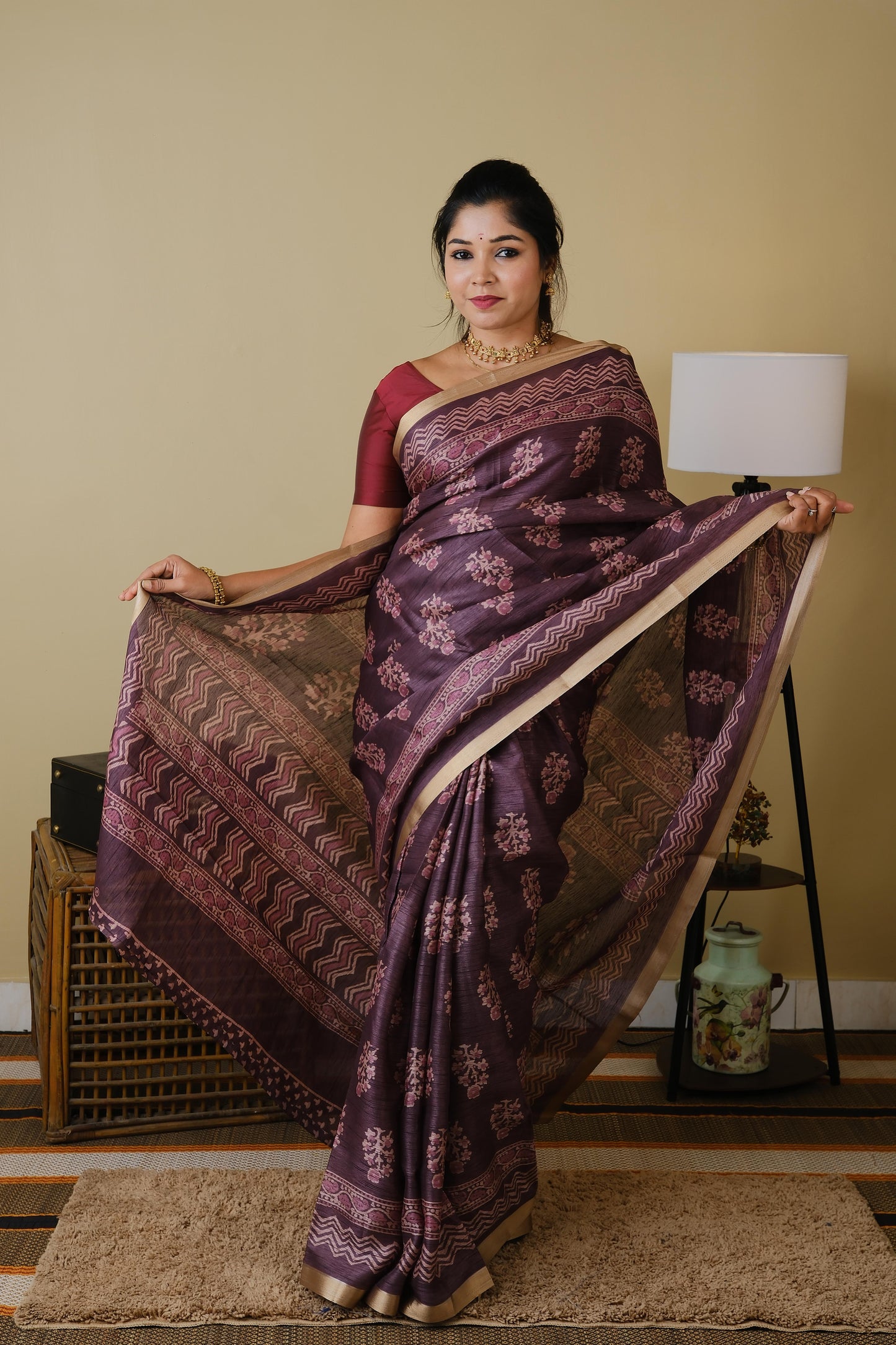 Tussar cotton in plum with floral motifs and saturn border - KRITHIKA