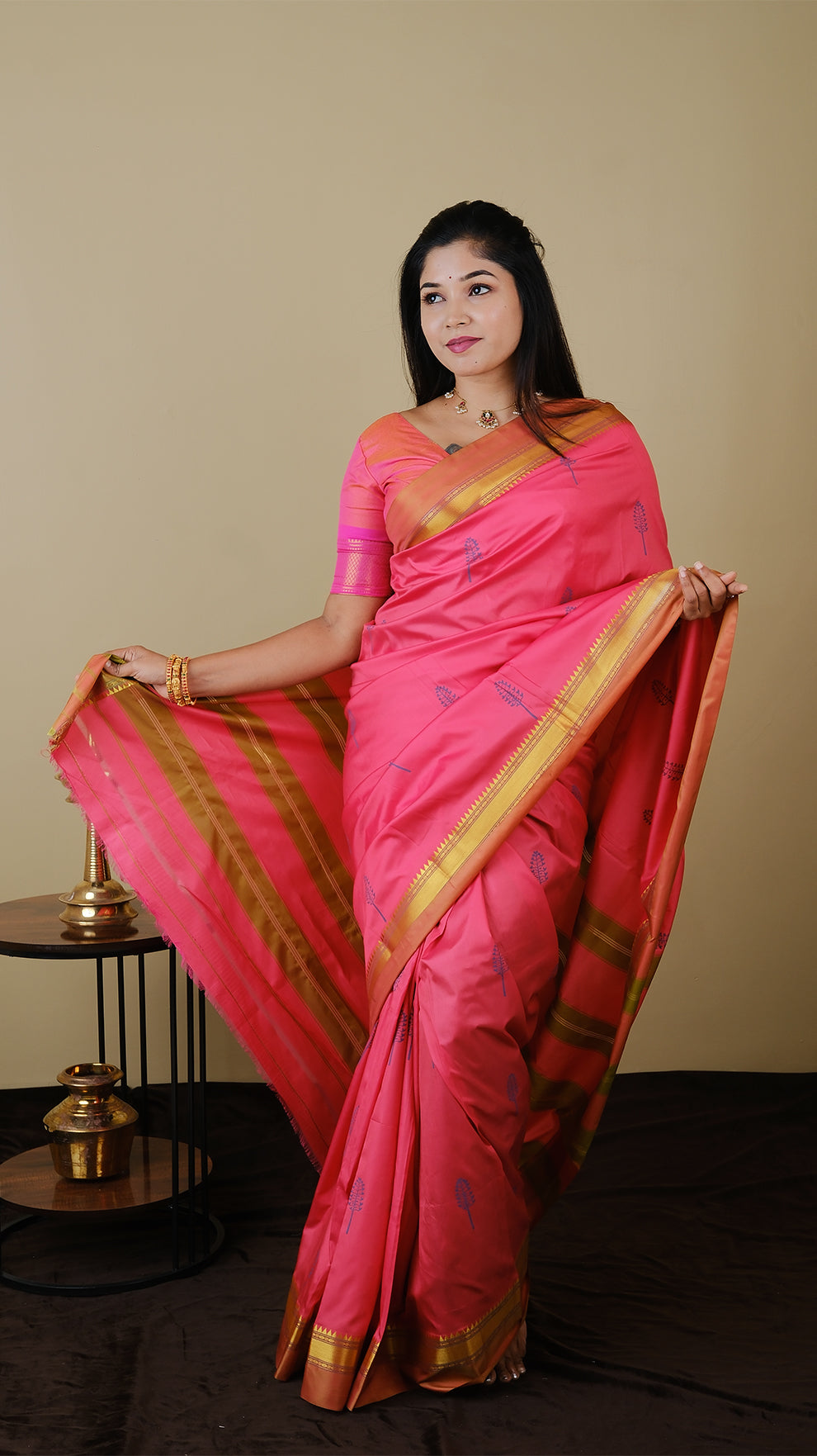 Elegant peach pink with olive combination silk saree adorned with blue woven motifs and contrasting gold zari border - AVANTHIKA (20003006)