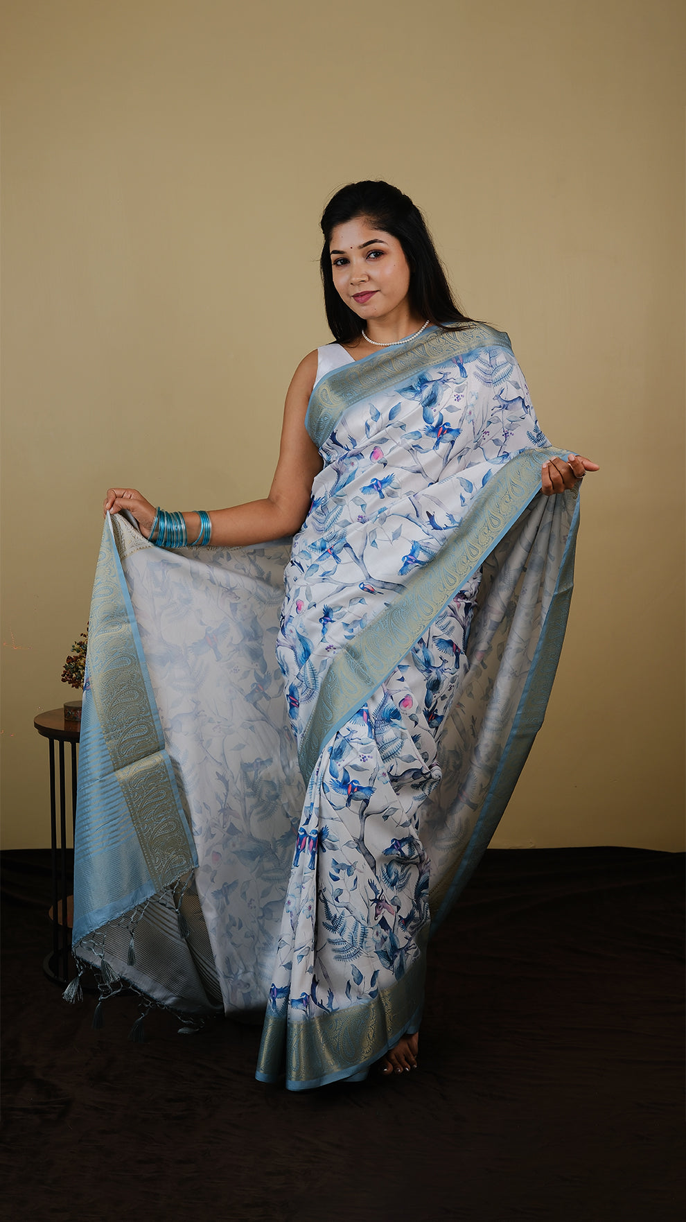 Digial print off white saree with all over bird print and teal green zari border - AVANTHIKA (20012008)