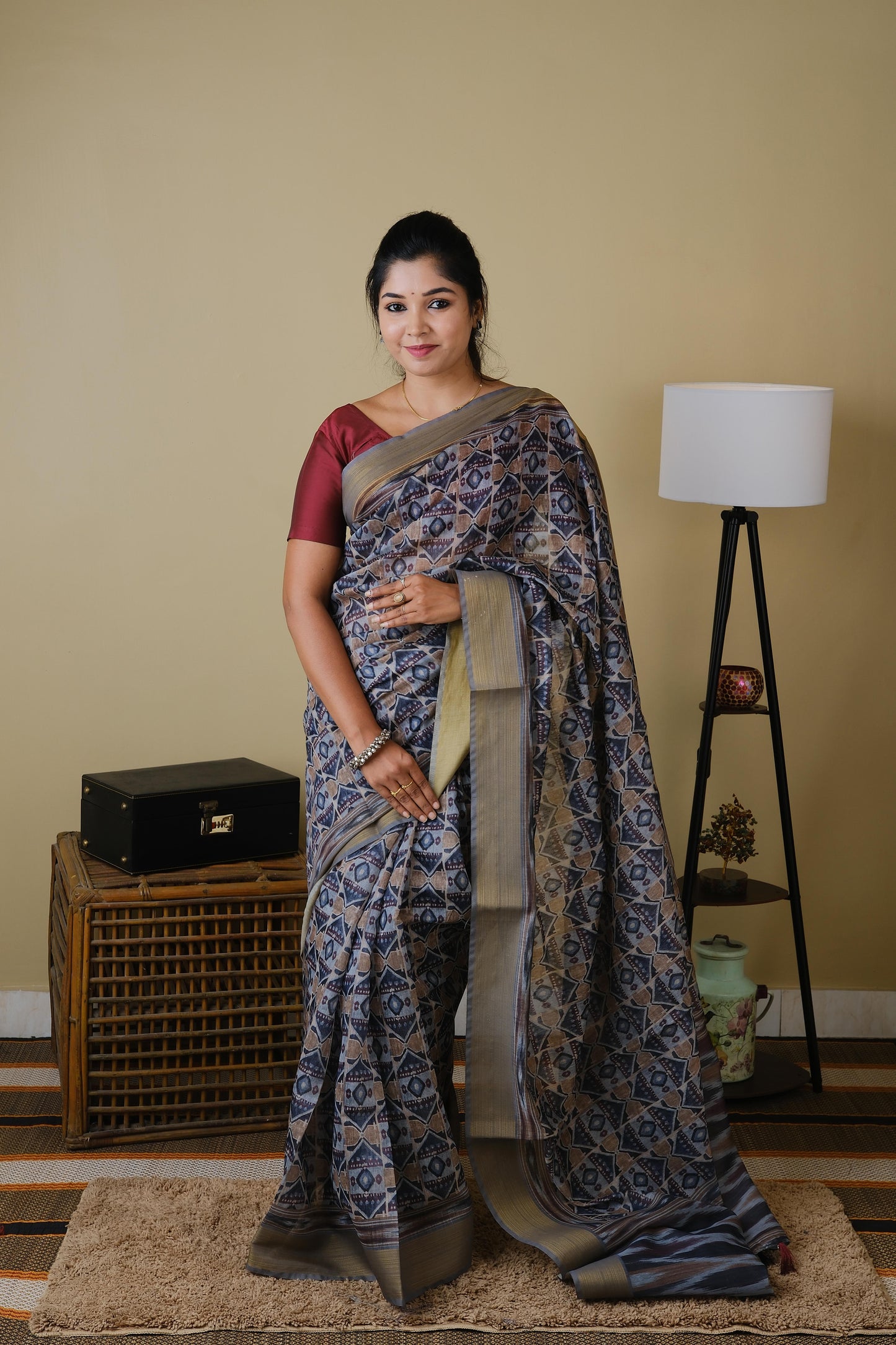 Soft cotton in light grey with all over tribal print and self zari border - BOOMIKA