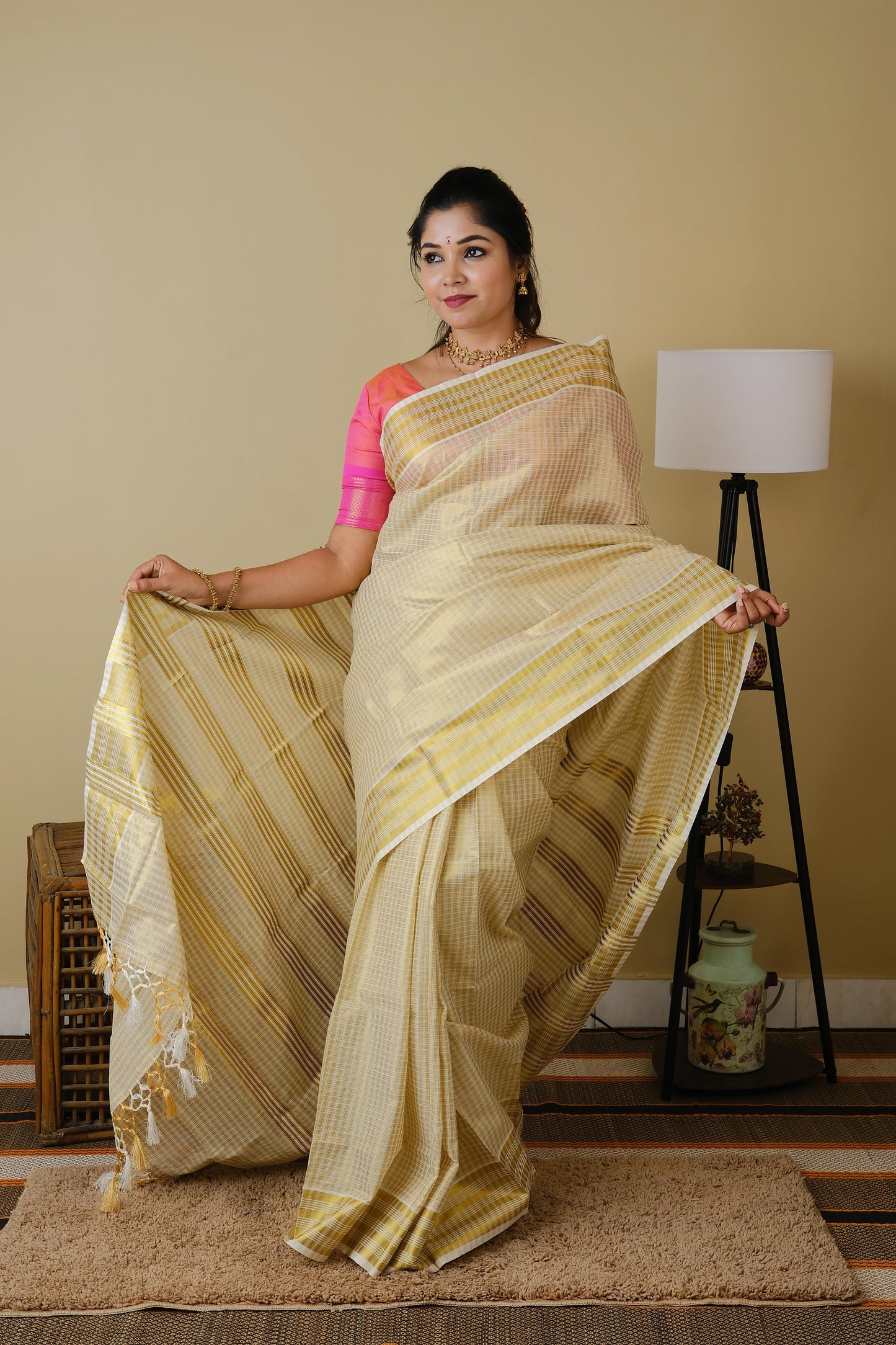 Onam kasavu silk in cream with all over checks in gold zari - AVANTHIKA