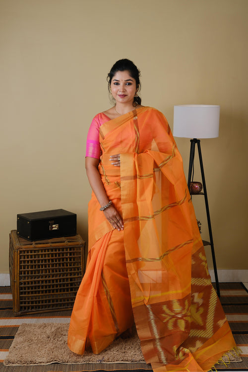 Handloom block print orange cotton saree with ikat style pallu - BOOMIKA