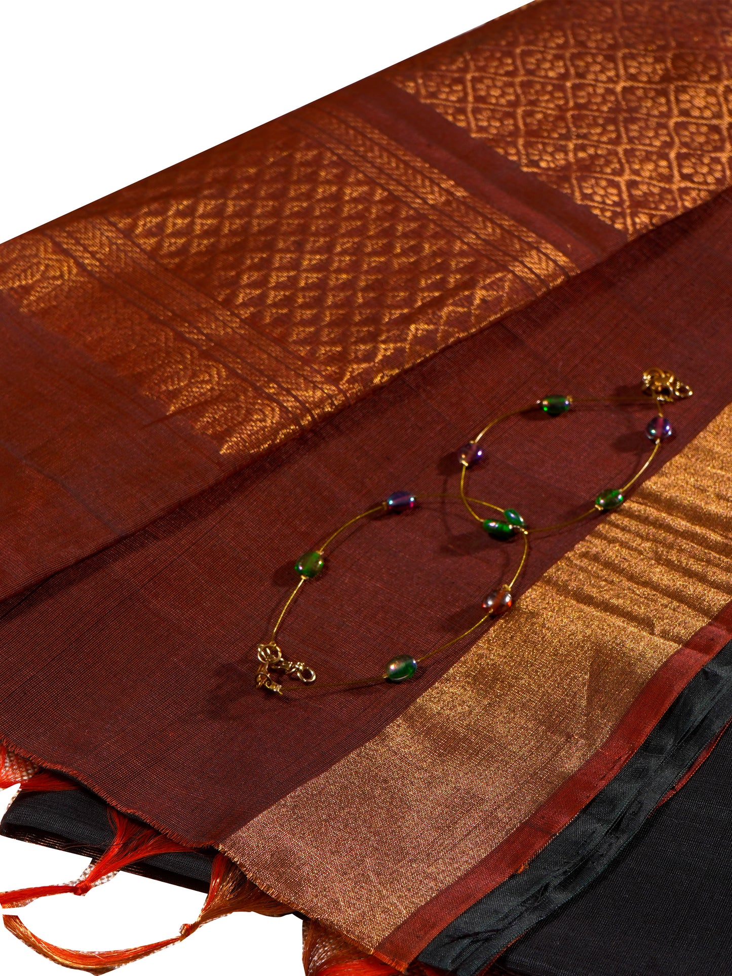 Exquisite silk cotton saree in bottle green and reddish maroon, handwoven with intricate designs - SWASTHIKA