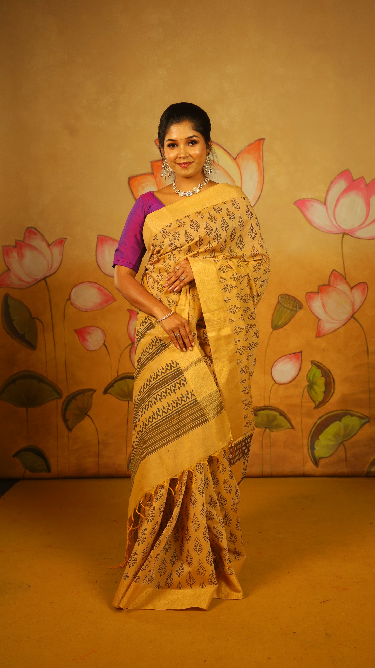 Timeless Handloom Cotton Saree with all-over Block-Printed Leaf Motifs and a subtle gold border. Designed for everyday comfort - BOOMIKA