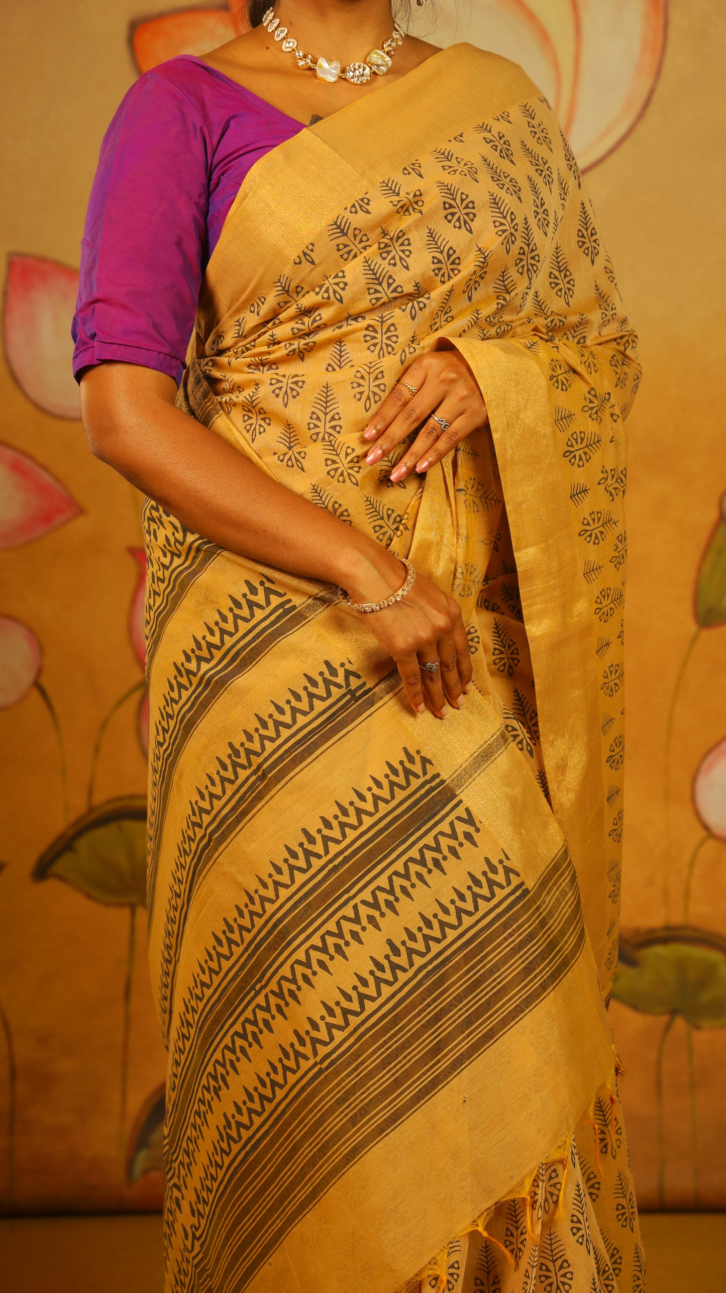Timeless Handloom Cotton Saree with all-over Block-Printed Leaf Motifs and a subtle gold border. Designed for everyday comfort - BOOMIKA