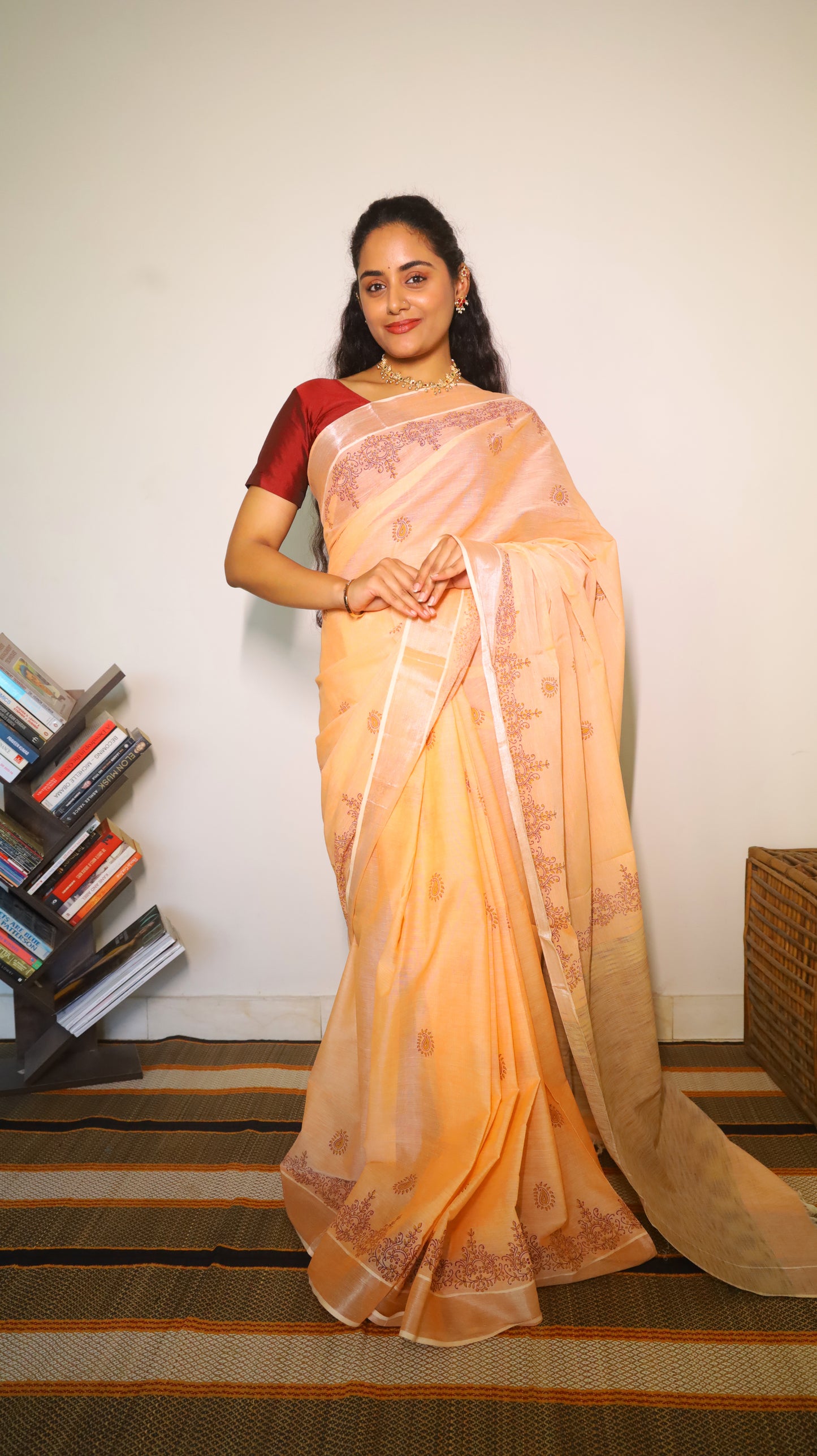 Graceful peach cotton saree with block prints in maroon buttas and border  - BOOMIKA