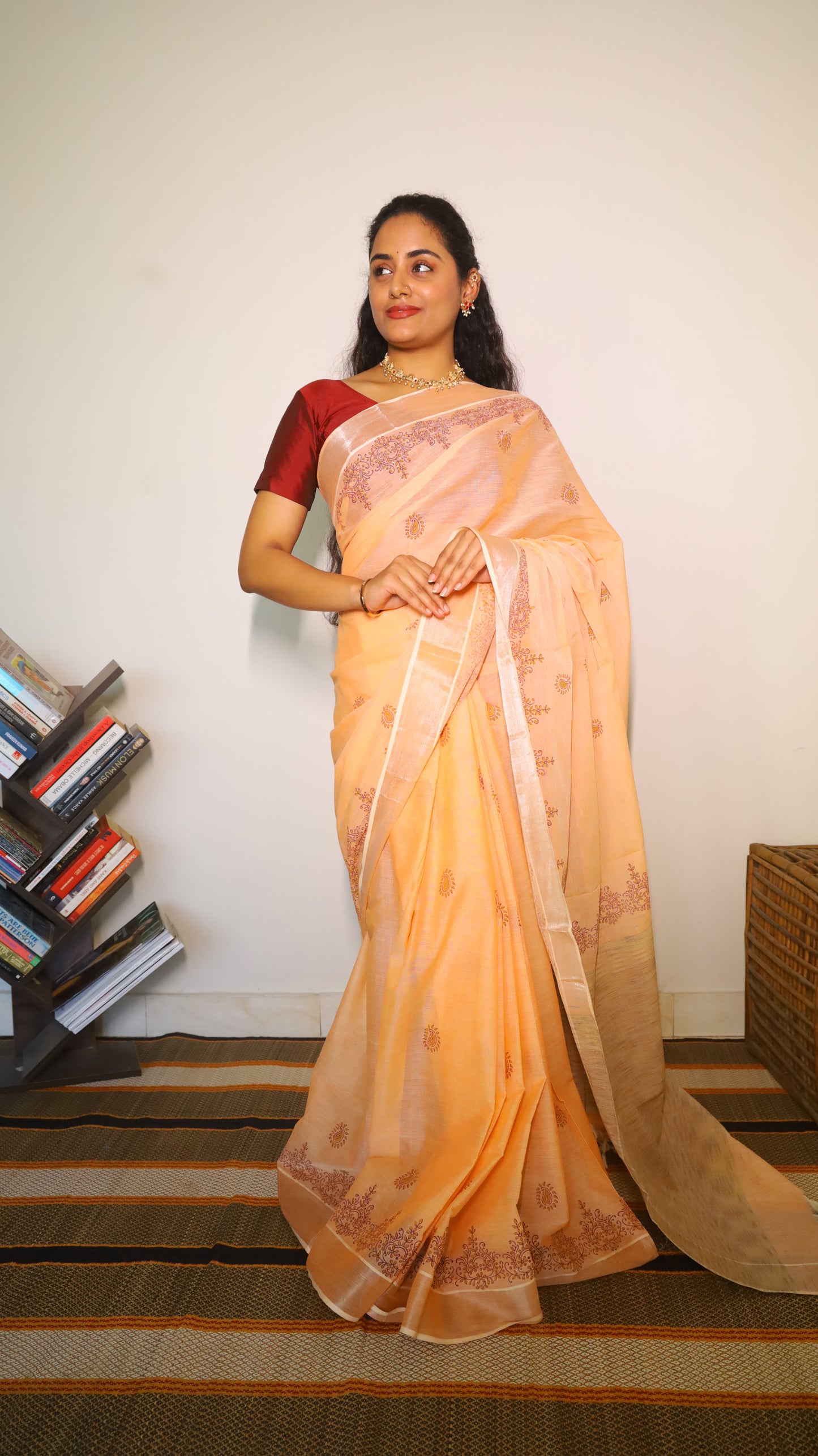 Graceful peach cotton saree with block prints in maroon buttas and border  - BOOMIKA