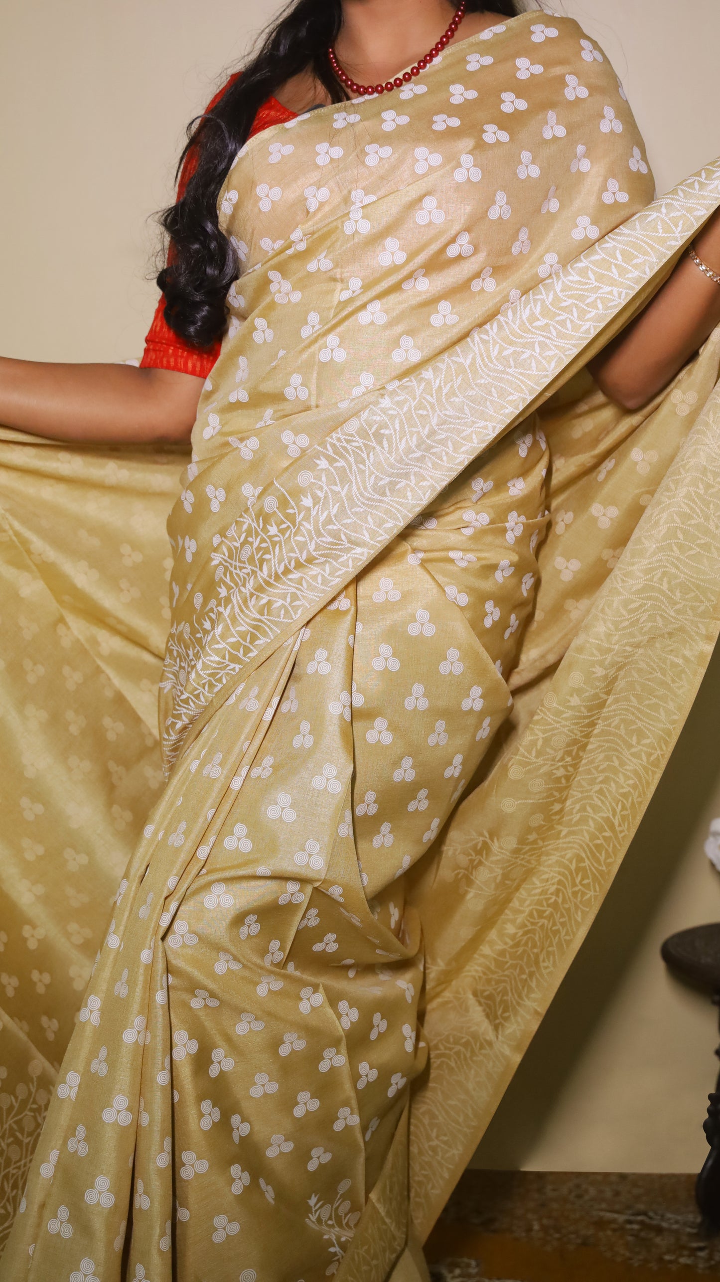 Elegant soft beige Jute Cotton saree featuring delicate white woven motifs throughout the body - BOOMIKA