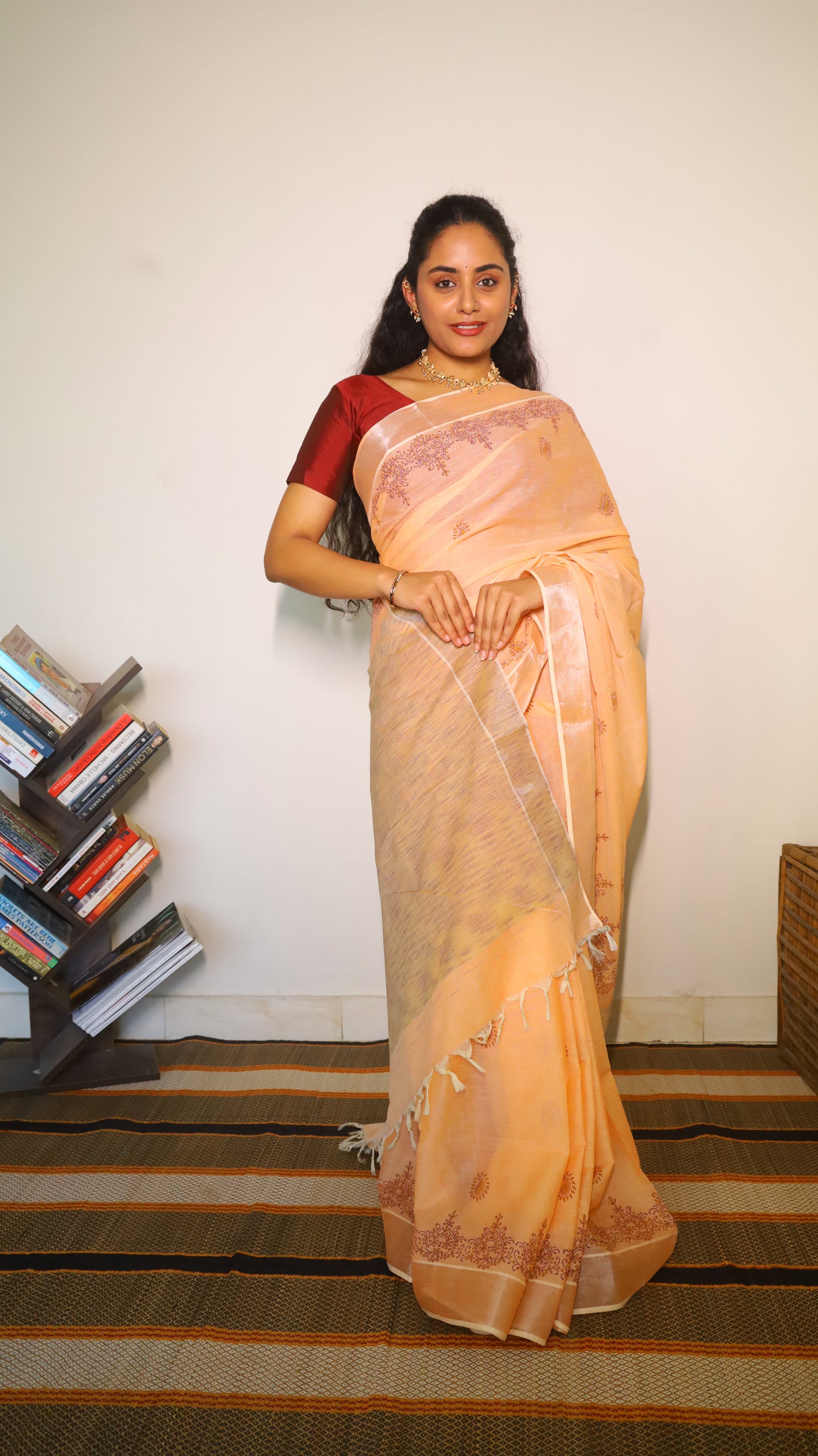 Graceful peach cotton saree with block prints in maroon buttas and border  - BOOMIKA