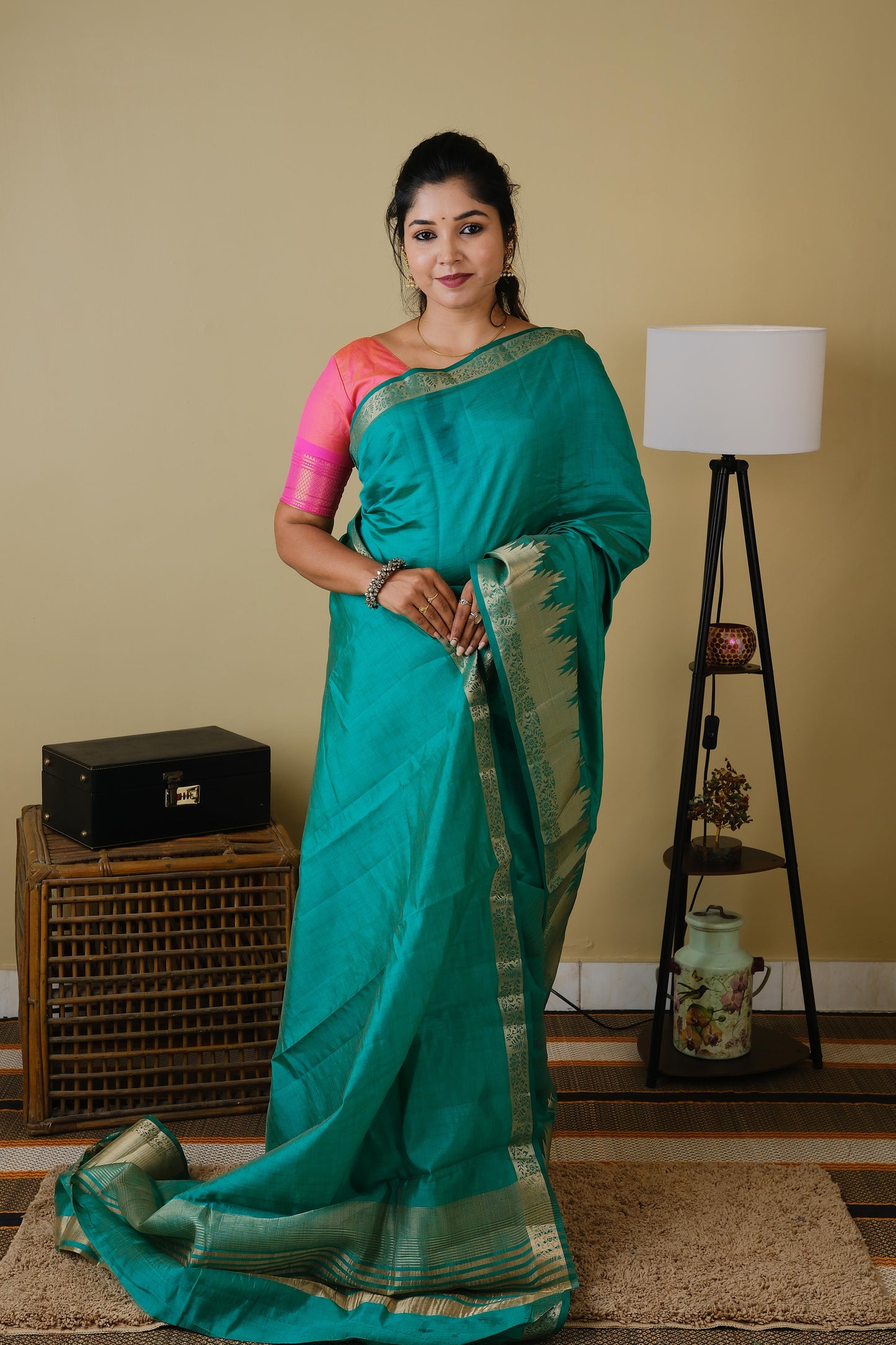 Soft silk in emerald green with tanjore zari porder and striped pallu - AVANTHIKA