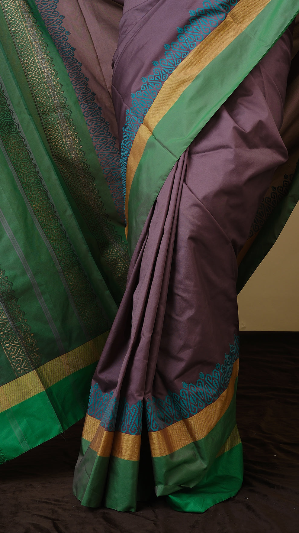 Soft silk saree in purplish brown and sea green block print with simple border in gold zari and parrot green - AVANTHIKA (20014003)