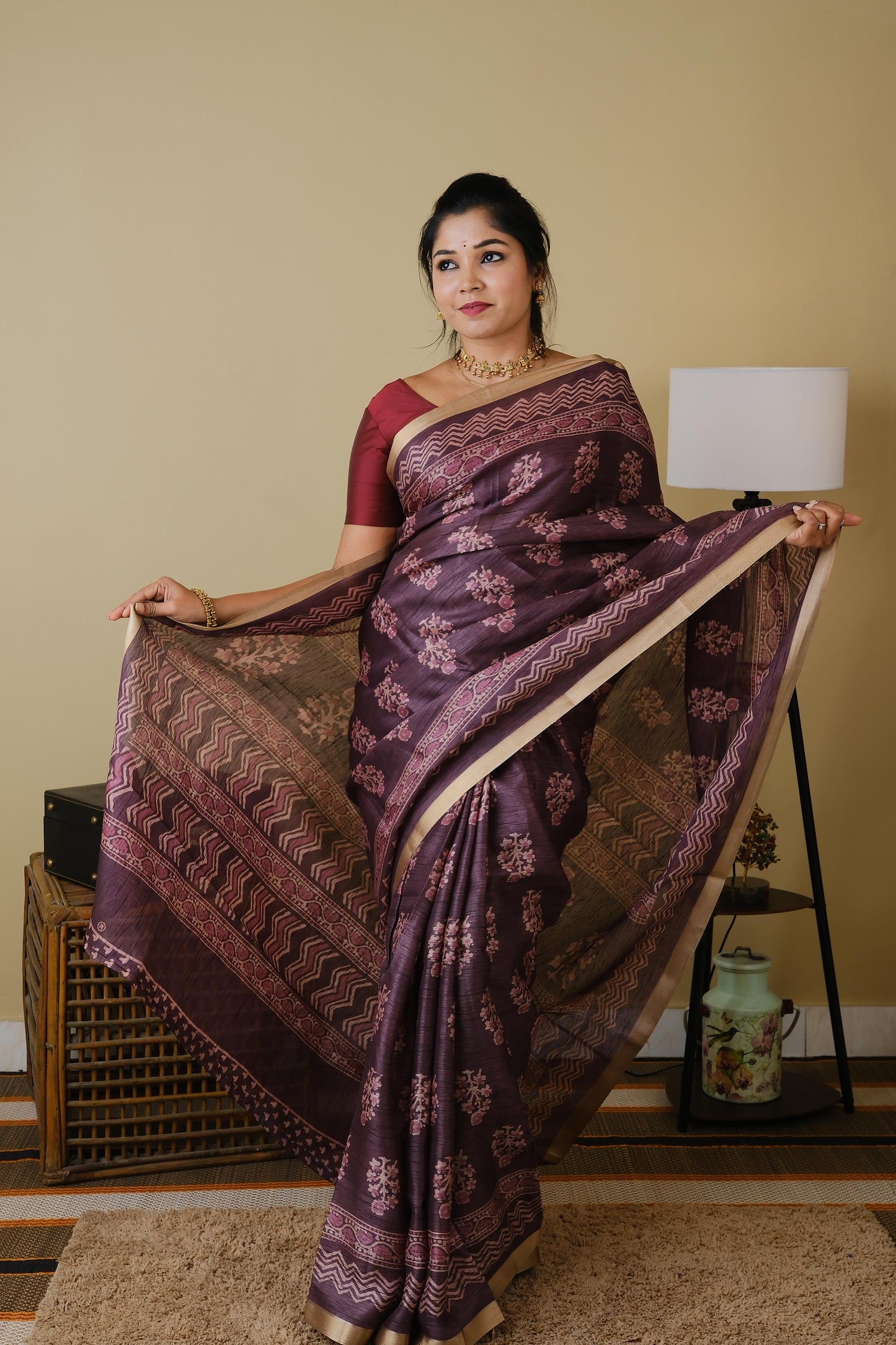 Tussar cotton in plum with floral motifs and saturn border - KRITHIKA