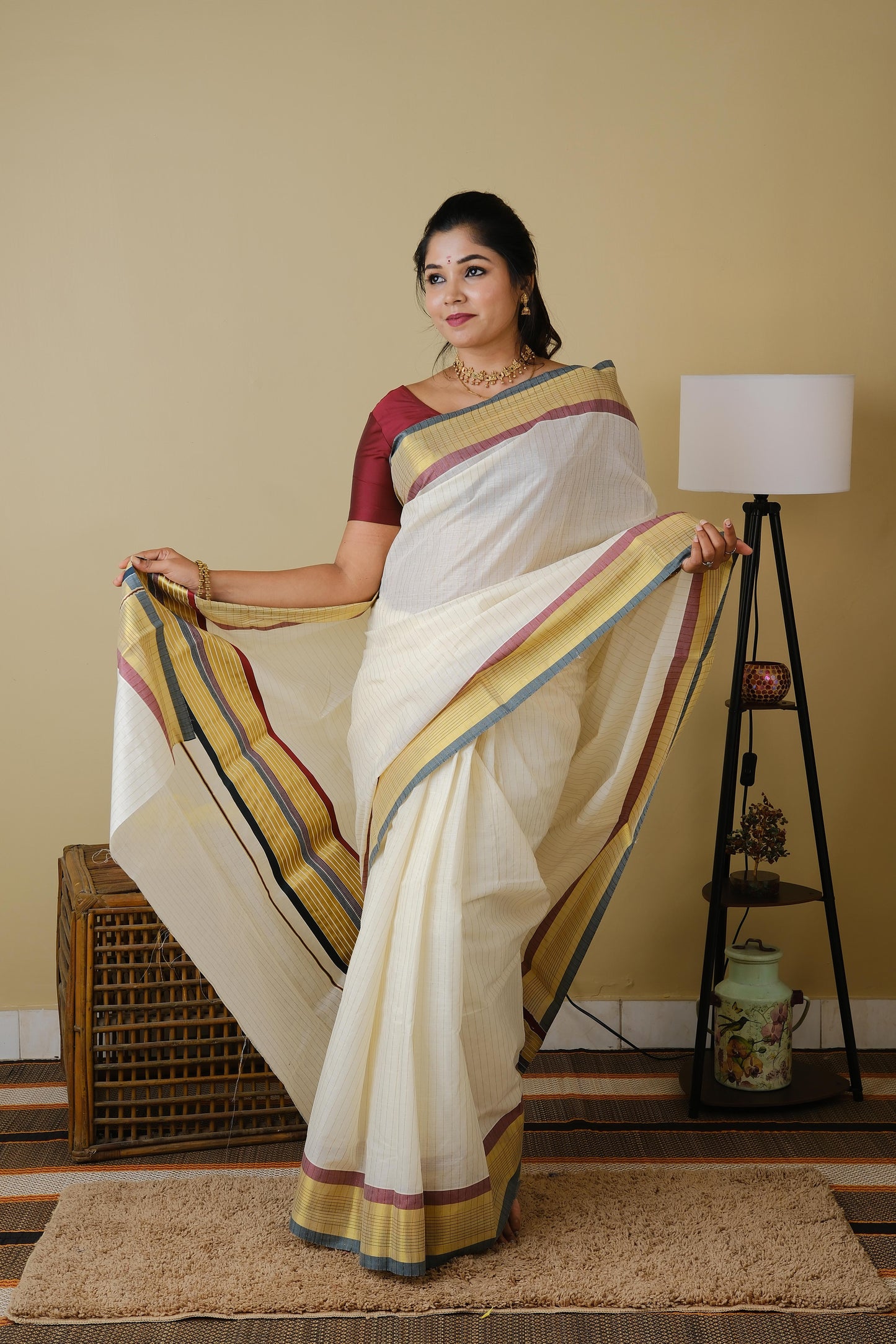 Pure kasavu cotton with striped zari body and double coloured border and pallu in traditional green and maroon - AVANTHIKA