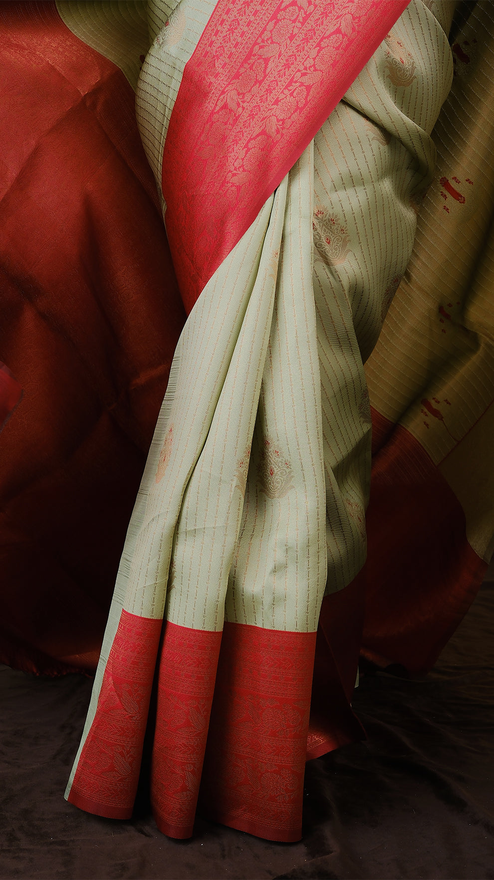 Soft silk brocade in pistha green with vairaoosi and gold motif body and chilli red contrast pallu with double zari border - AVANTHIKA (20009007)