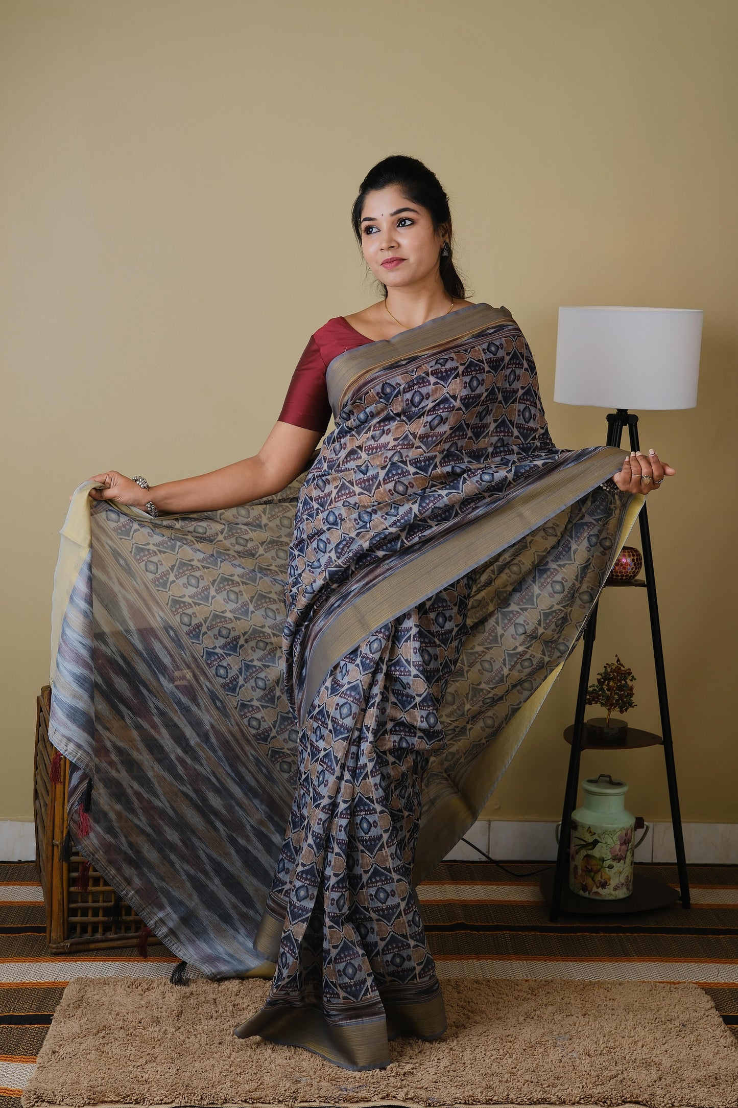 Soft cotton in light grey with all over tribal print and self zari border - BOOMIKA