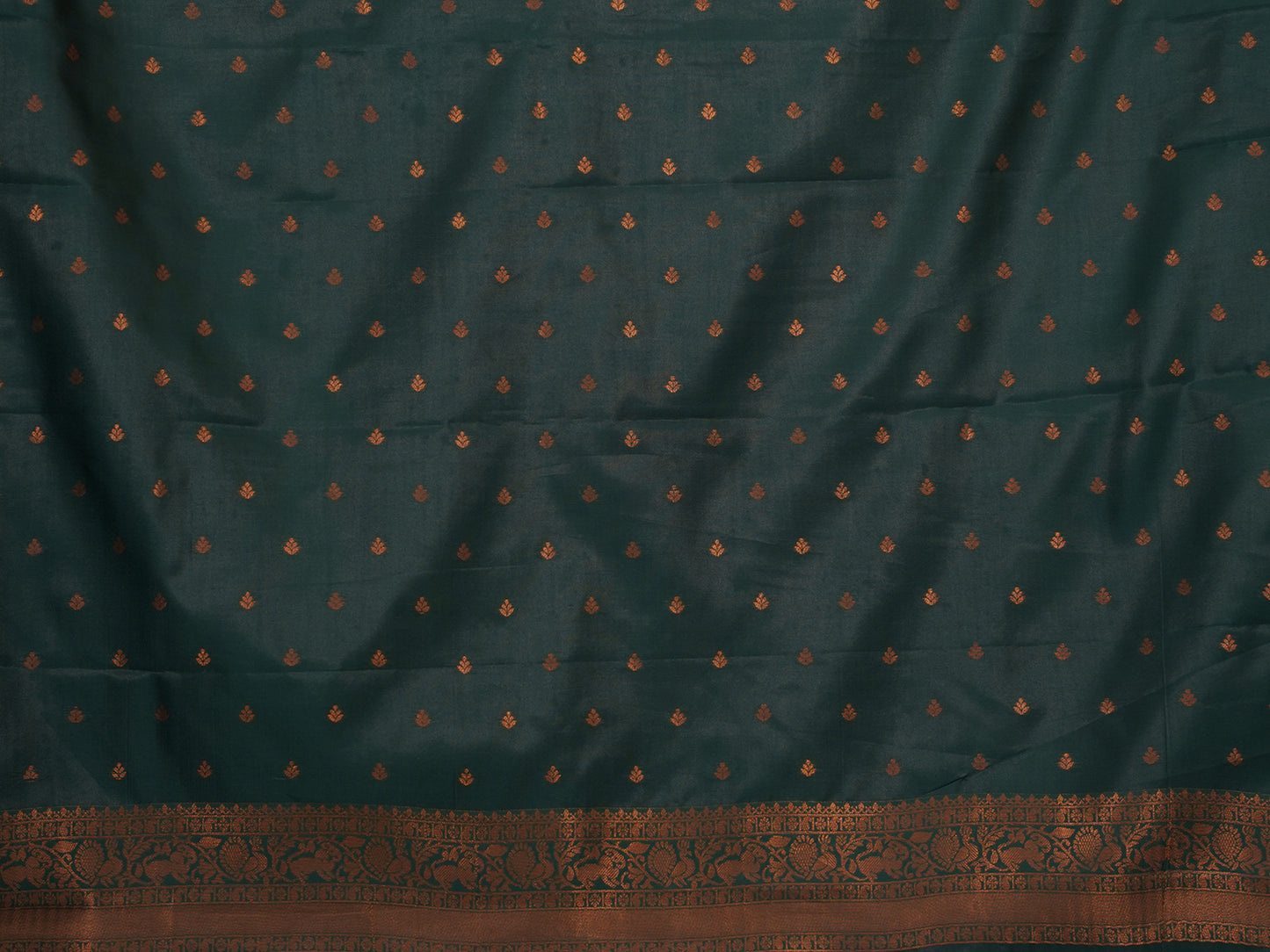 Luxurious soft silk red tissue saree with self imprint and bottle green border with gold zari - AVANTHIKA