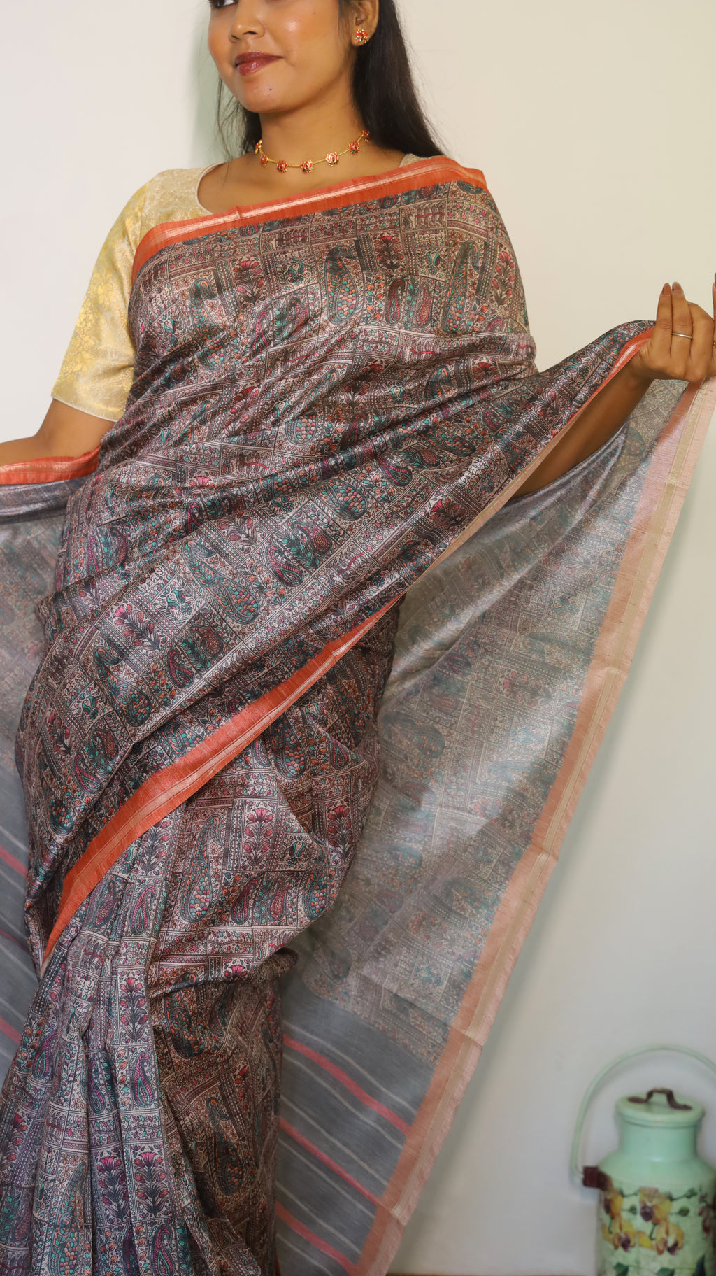 Semi tussar saree in light grey and mughal paisley prints with a contemporary peach pink light zari border - KRITHIKA (40012011)