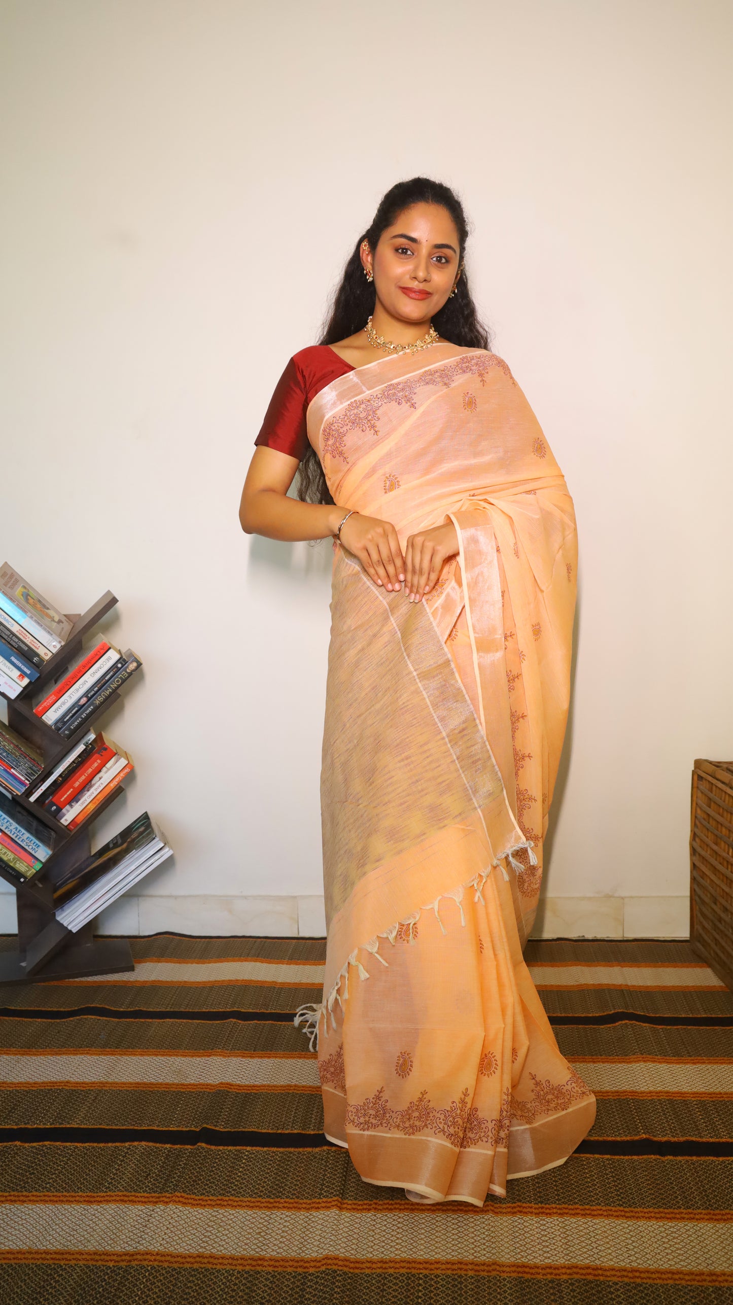 Graceful peach cotton saree with block prints in maroon buttas and border  - BOOMIKA