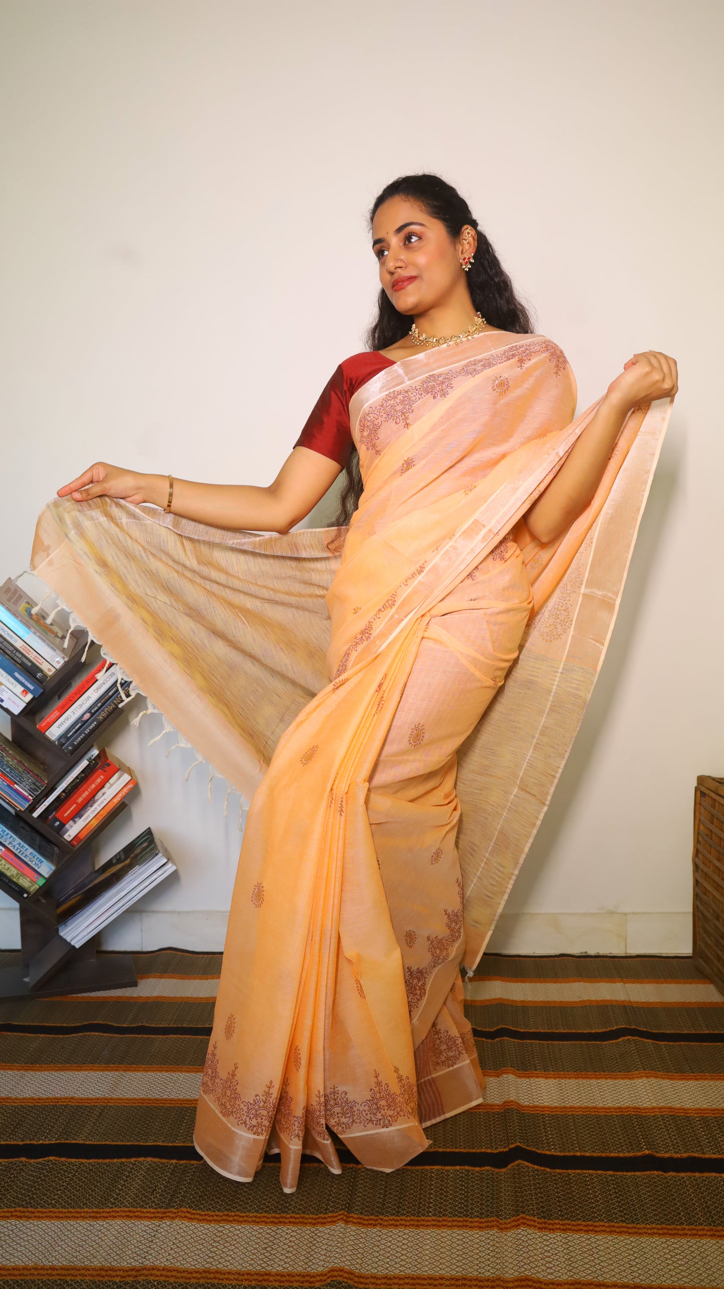 Graceful peach cotton saree with block prints in maroon buttas and border  - BOOMIKA