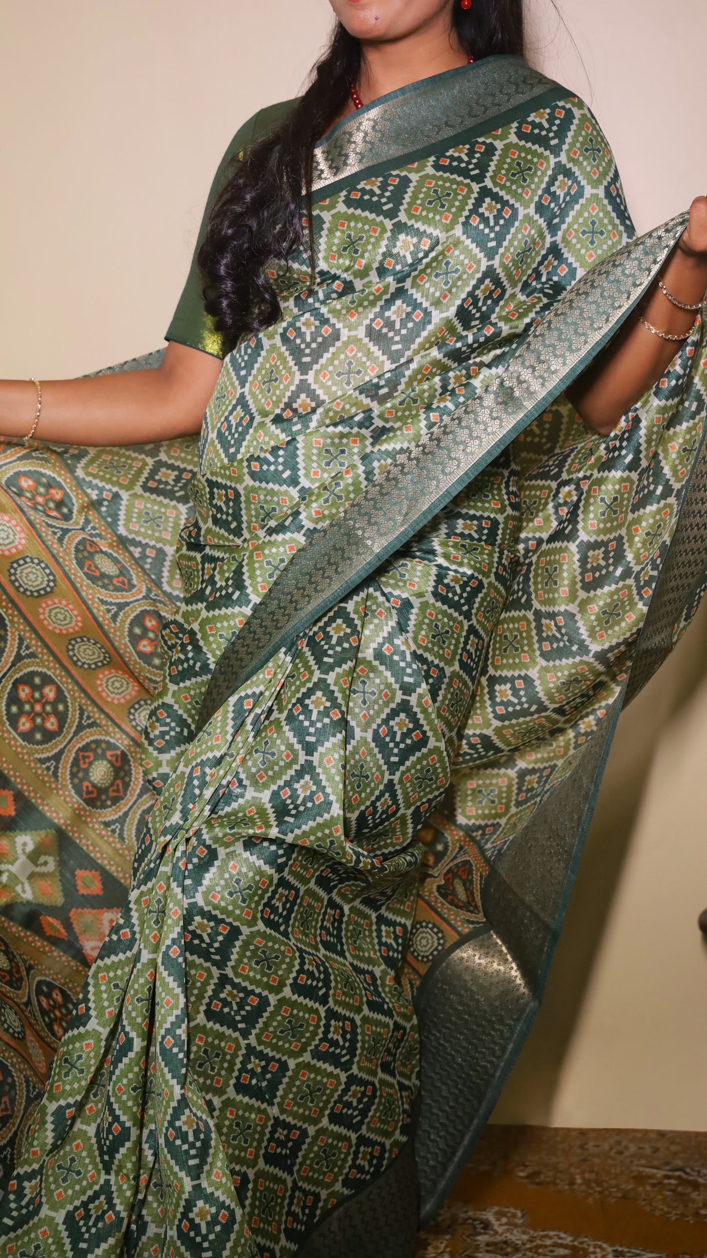 Finest green Kilimanjaro Cotton saree patterned with diamond-shaped motifs in mustard and black and contrast dark green border - BOOMIKA