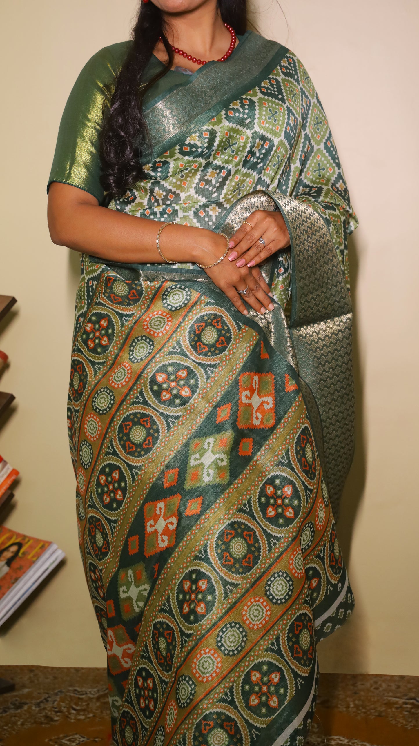 Finest green Kilimanjaro Cotton saree patterned with diamond-shaped motifs in mustard and black and contrast dark green border - BOOMIKA