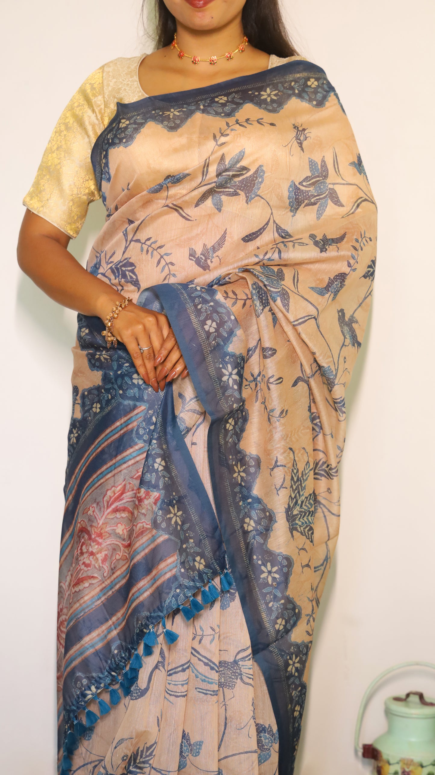 Artisanal beige Chanderi Silk Cotton saree decorated with nature-inspired motifs of birds and florals in muted tones - BOOMIKA